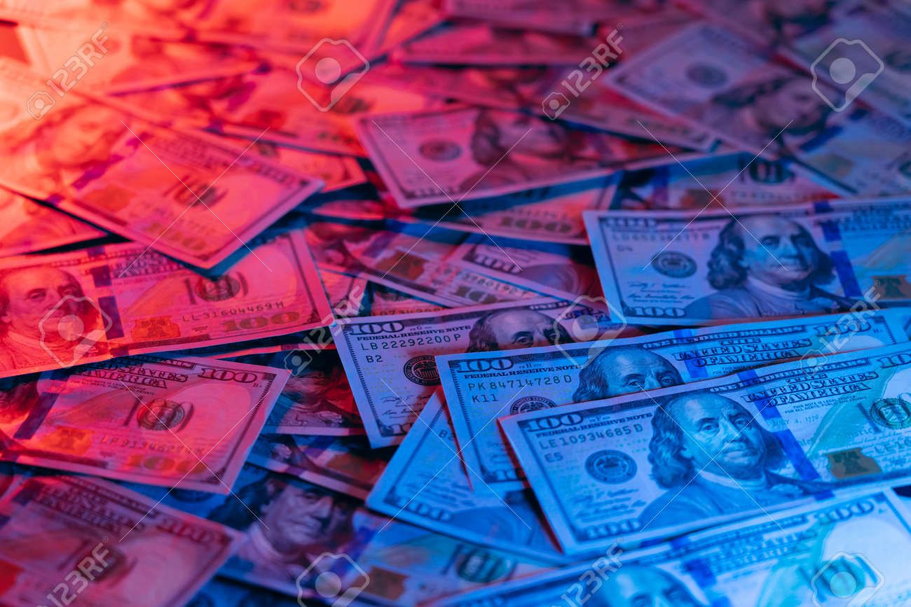 1300x867 Money Background. Dollars Lighted By Blue And Red. Financial Market , Picture and Royalty Free Image. Image 182034135