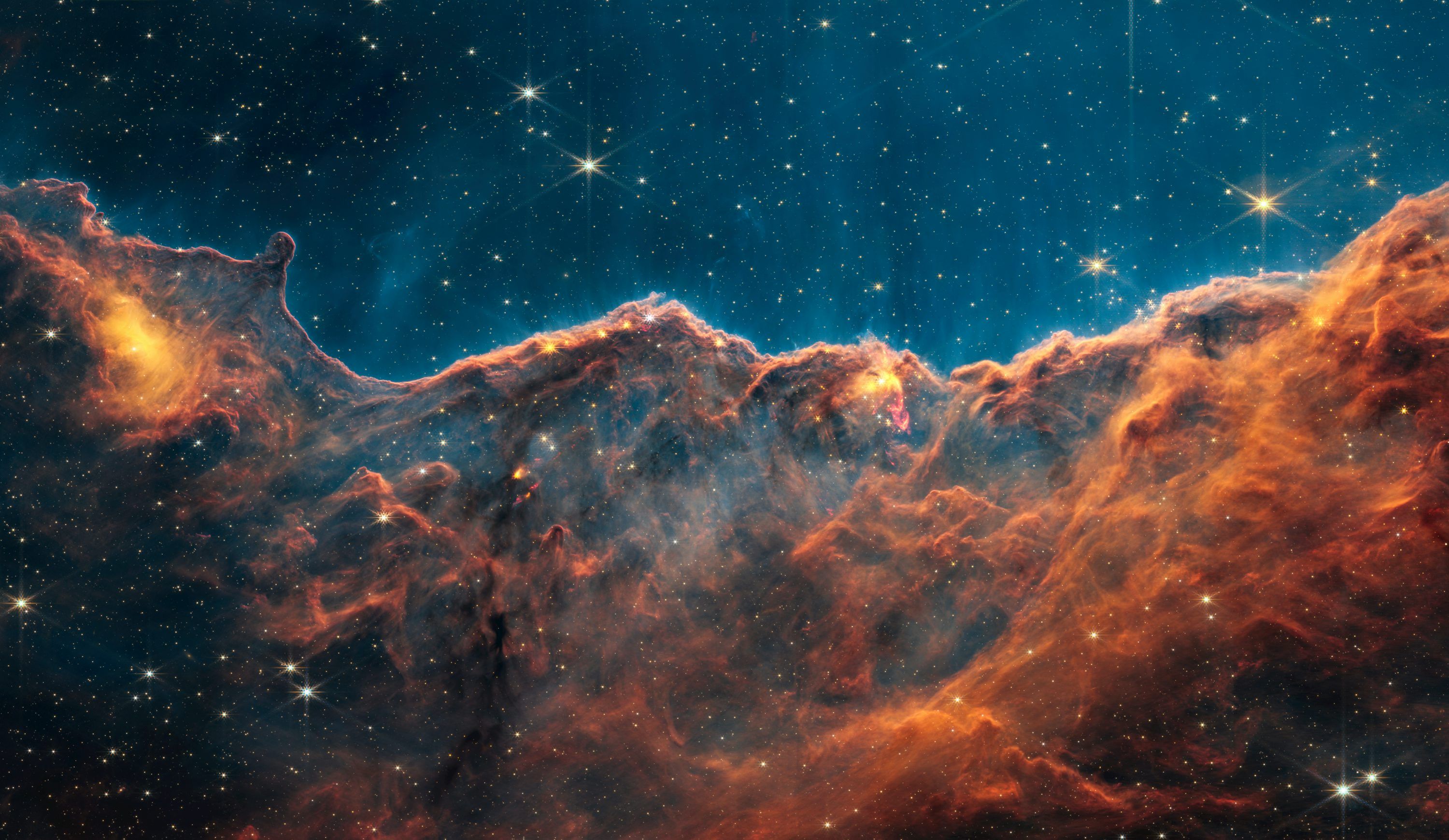 3000x1740 An image of a large star cluster in the sky photo