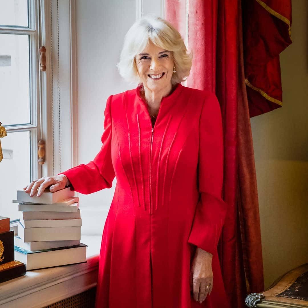 1080x1080 Download Queen Camilla In Red Dress Wallpaper