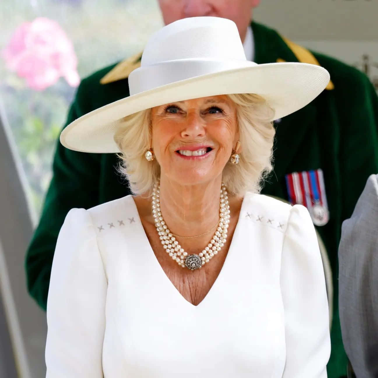 1297x1297 Download Queen Camilla In White Outfit Wallpaper