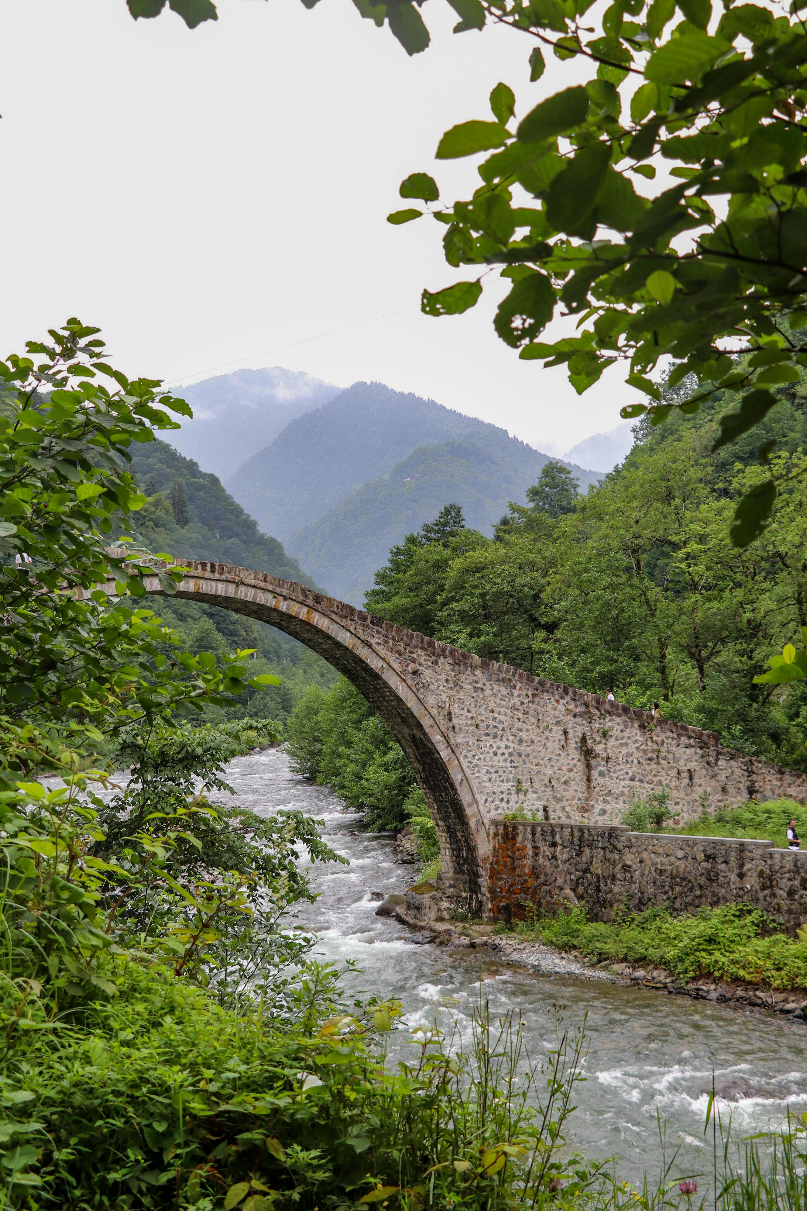2656x3984 Stone Arch Stone over River in Mountain Landscape · Free