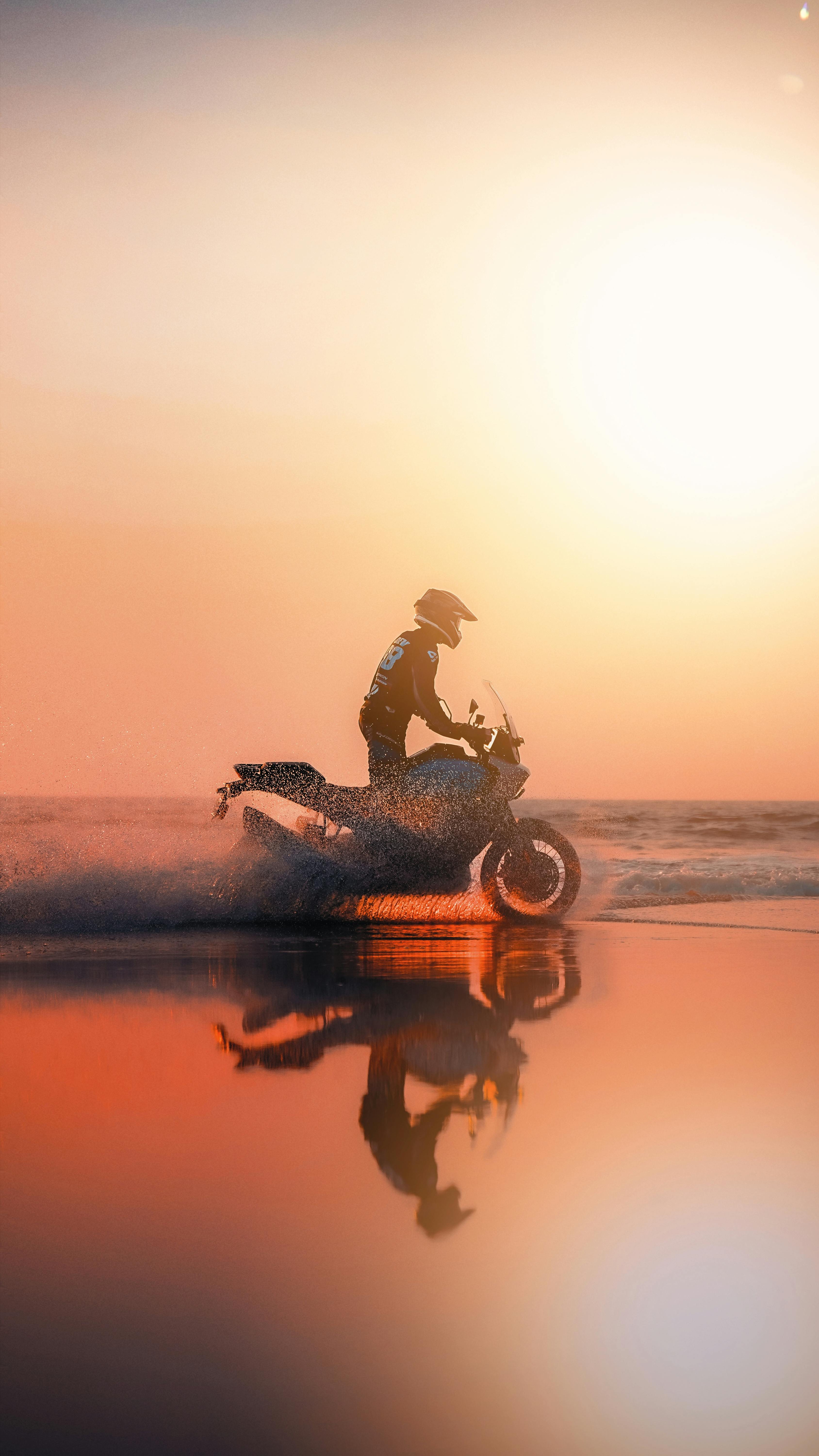 3376x6000 Biker Riding Motorcycle on Beach at Sunset · Free