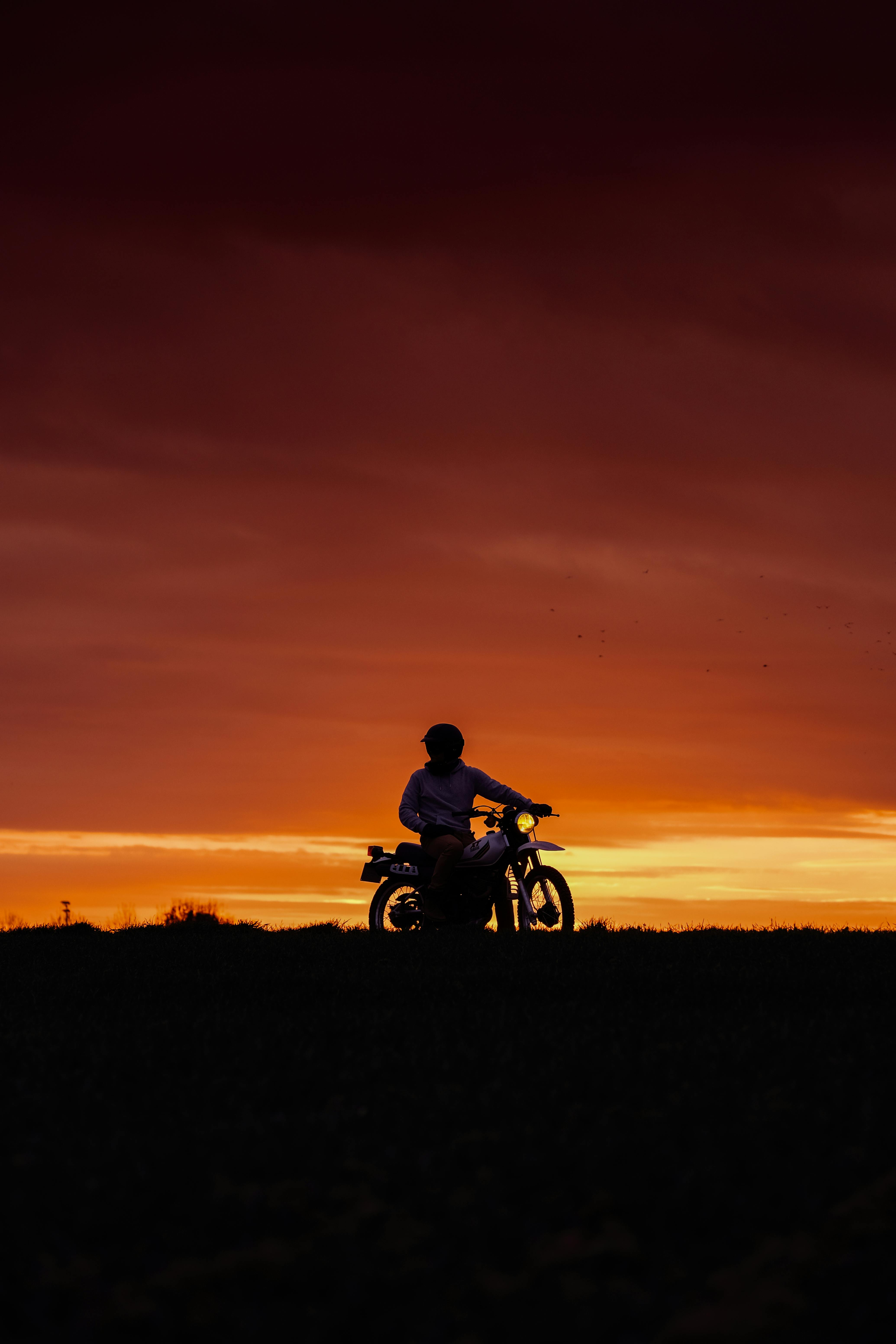 4139x6208 Man Riding Motorcycle during Sunset · Free