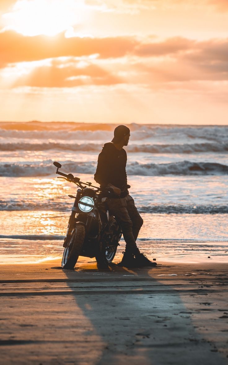 736x1177 Wallpaper loneliness motorcyclist silhouette motorcycle sunset
