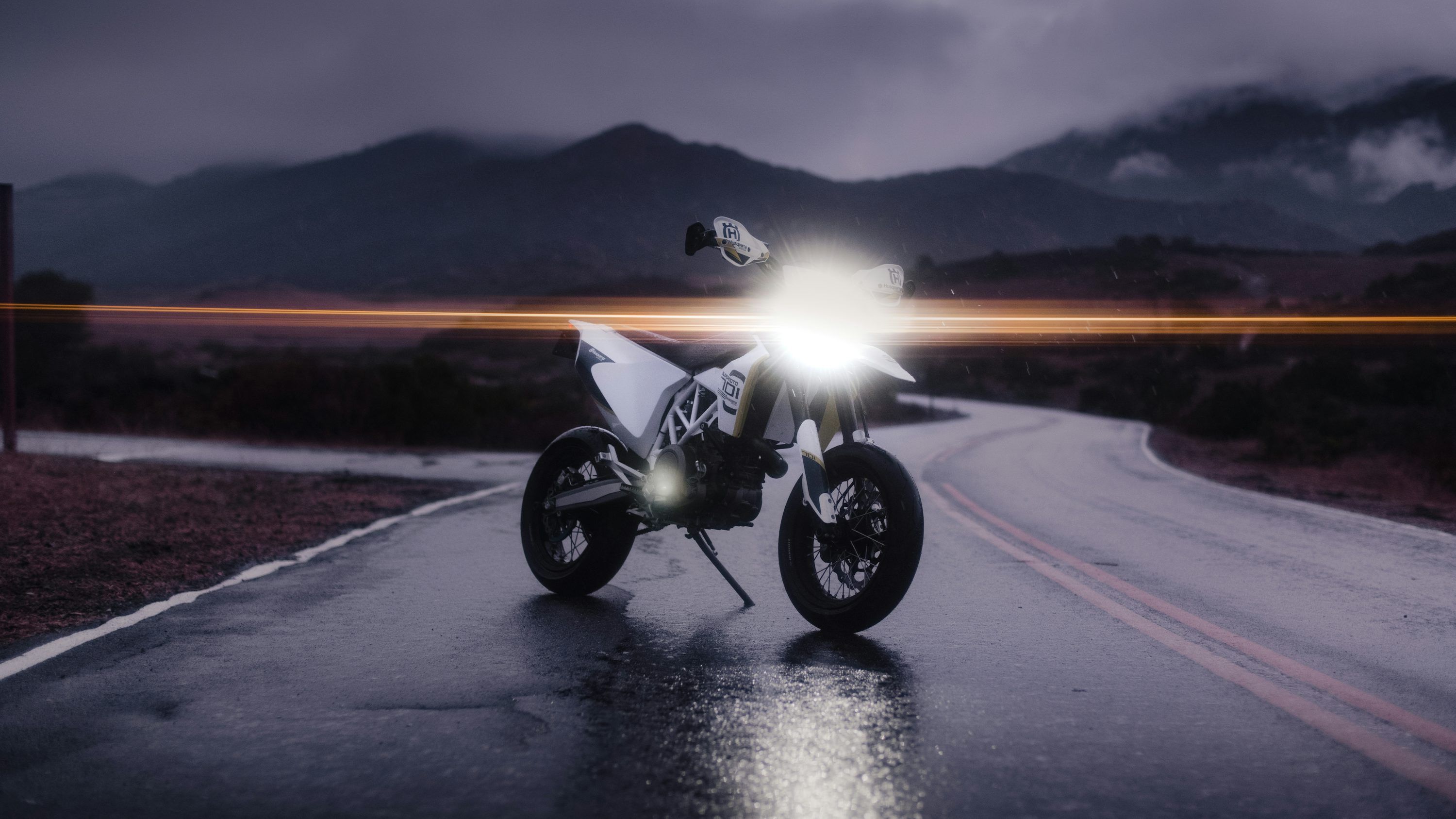 3000x1687 Black motorcycle on road during sunset photo