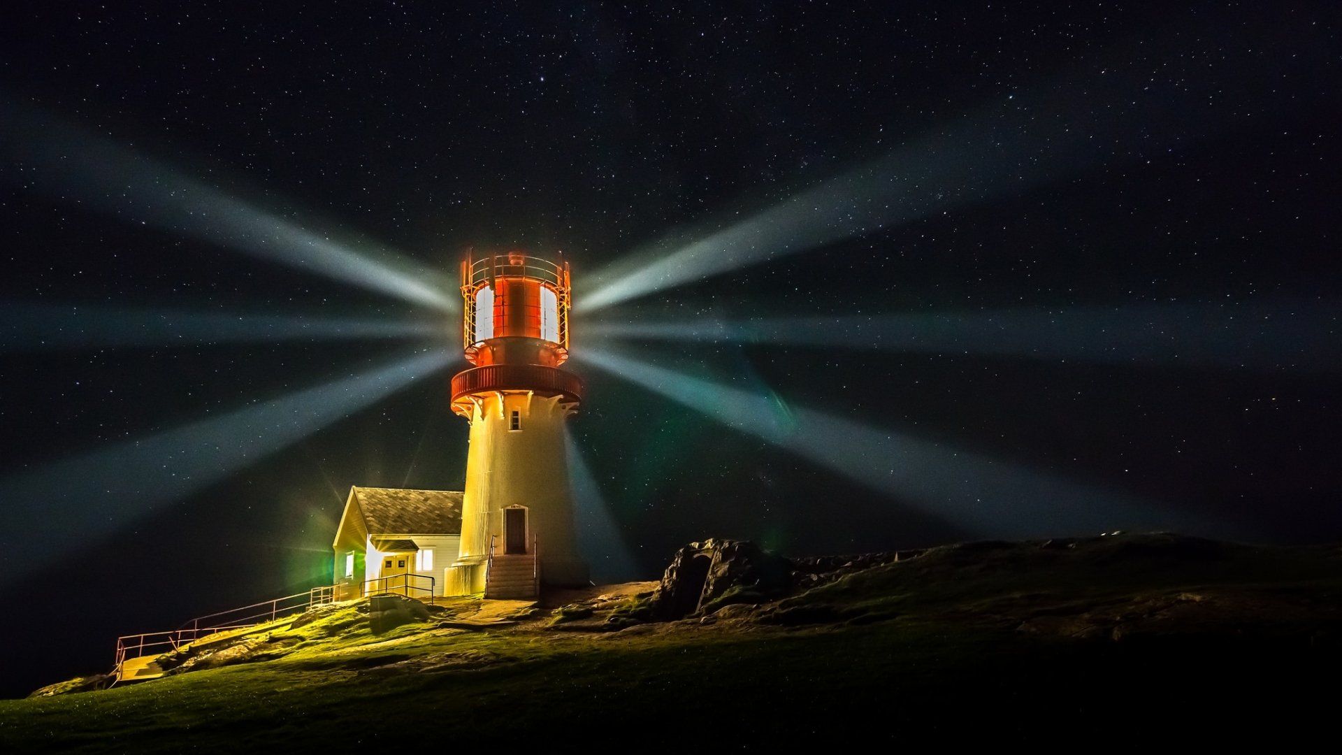 1920x1080 Guiding Light Under a Starry Night Sky