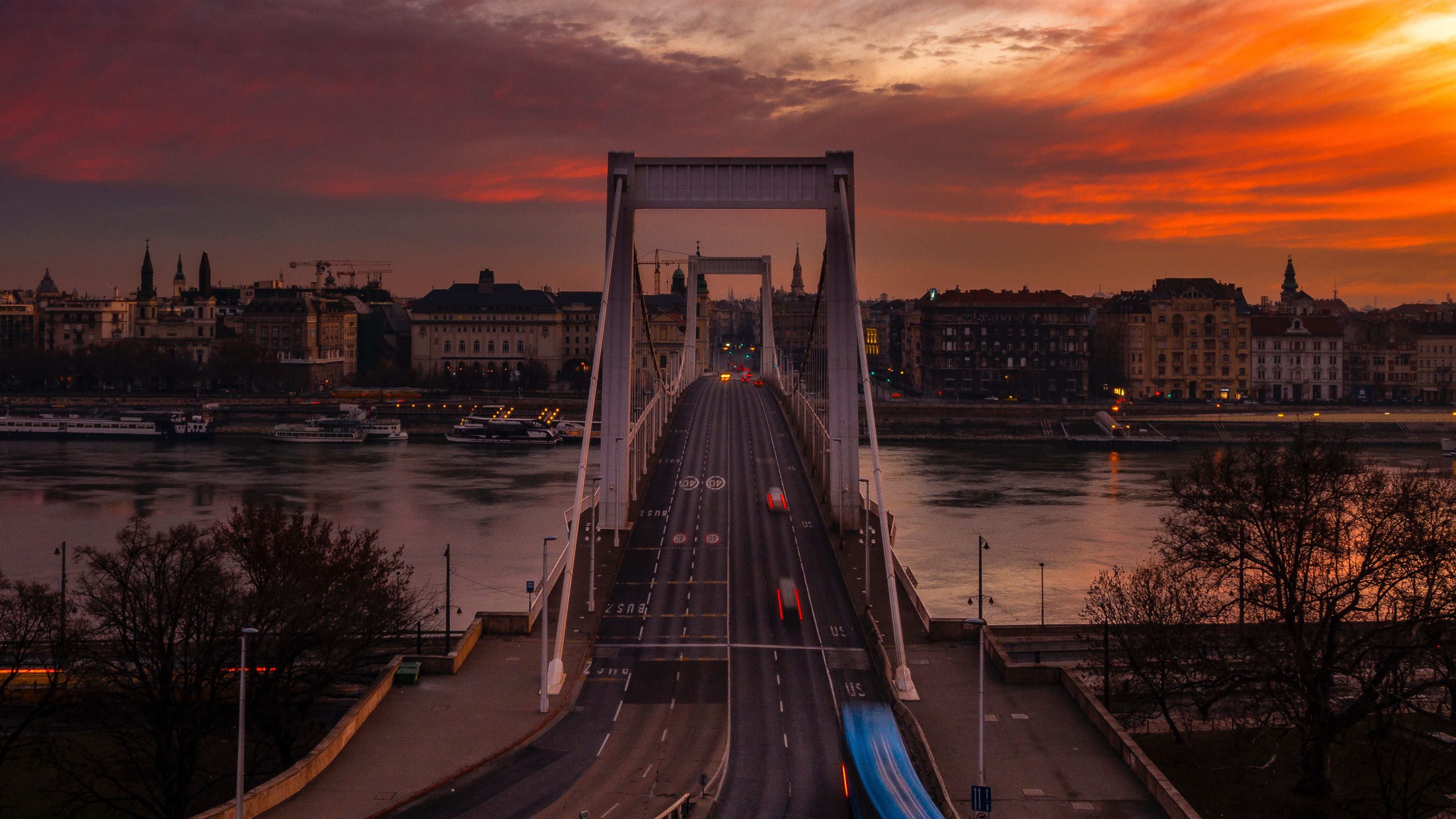 3840x2160 Download wallpaper 3840x2160 bridge, sunset, city, budapest, hungary 4k uhd 16:9 HD background