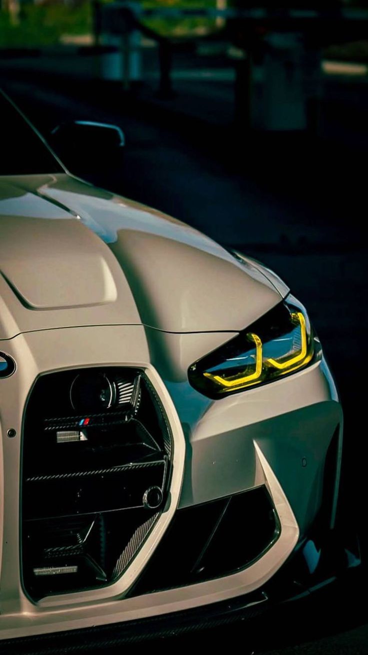 736x1308 BMW M4 FRONT HEADLIGHT WALLPAPER