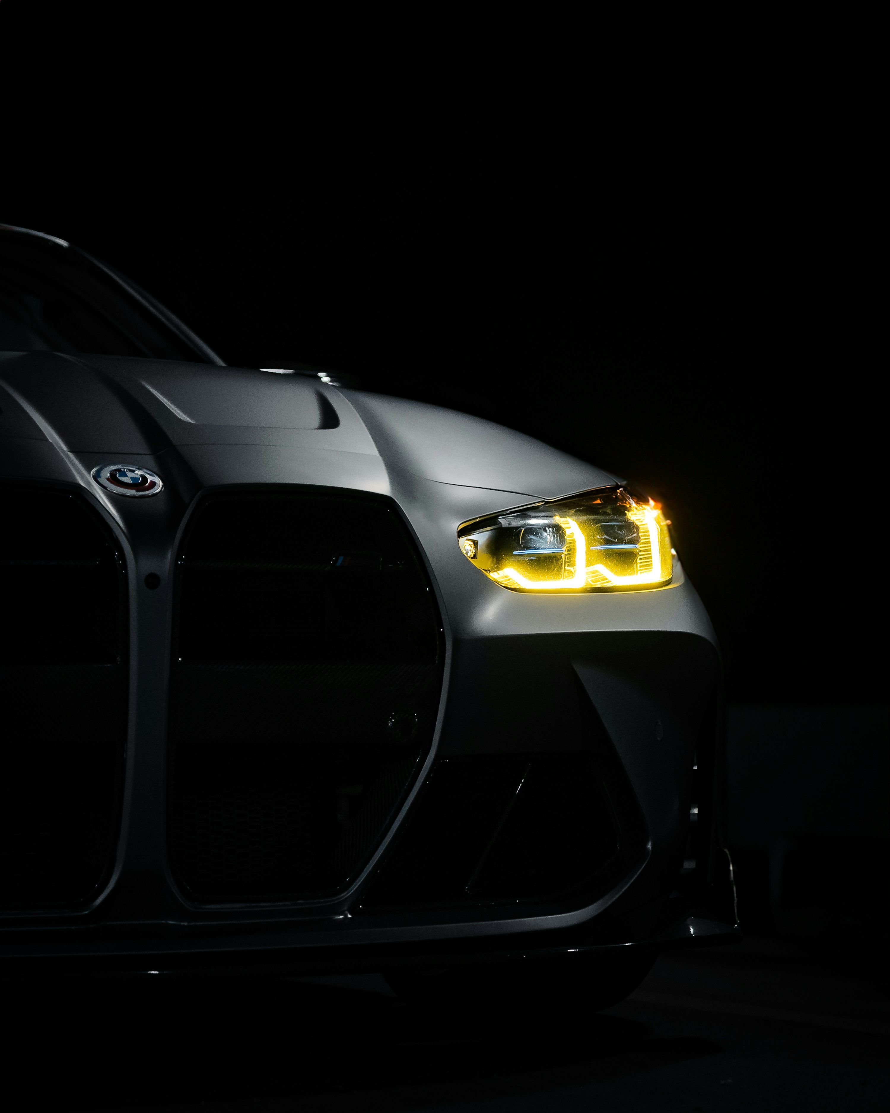 3000x3750 A car that is sitting in the dark photo