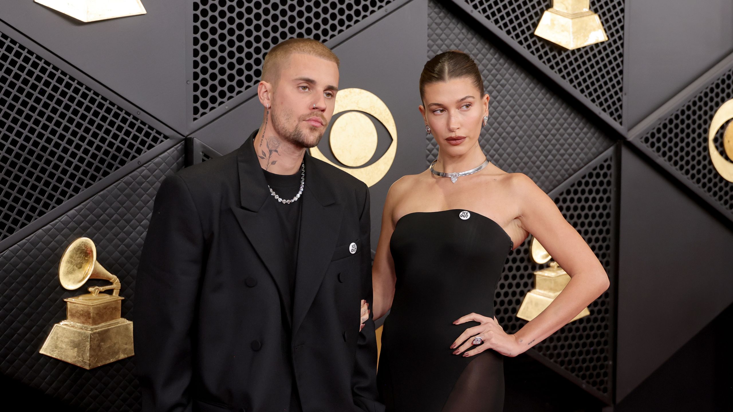2560x1440 Justin & Hailey Bieber Take Grammys 2026 Red Carpet With “ICE Out” Pins