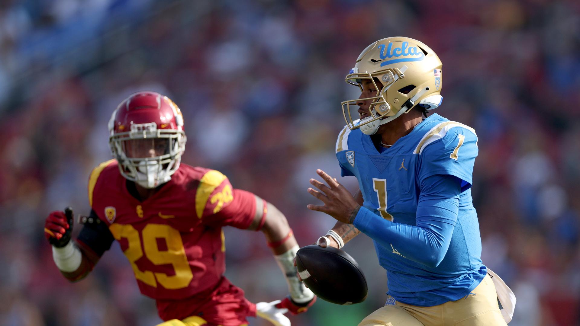 1920x1080 UCLA QB Dorian Thompson Robinson Signs Autograph Mid Game After Touchdown Vs. USC