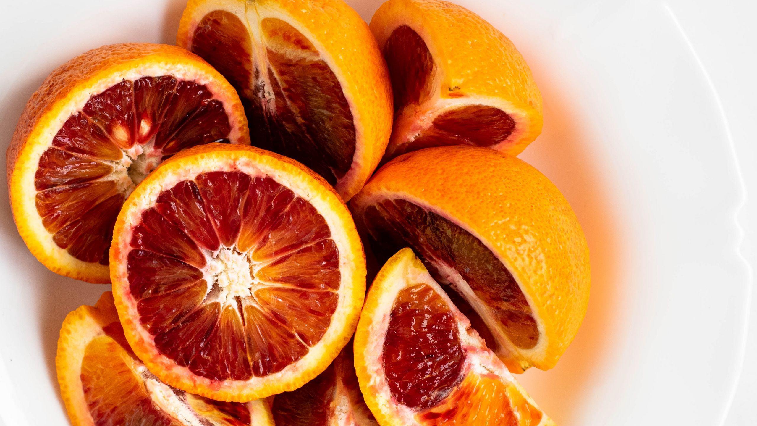 2560x1440 Download wallpaper 2560x1440 grapefruit, slices, still life, white
