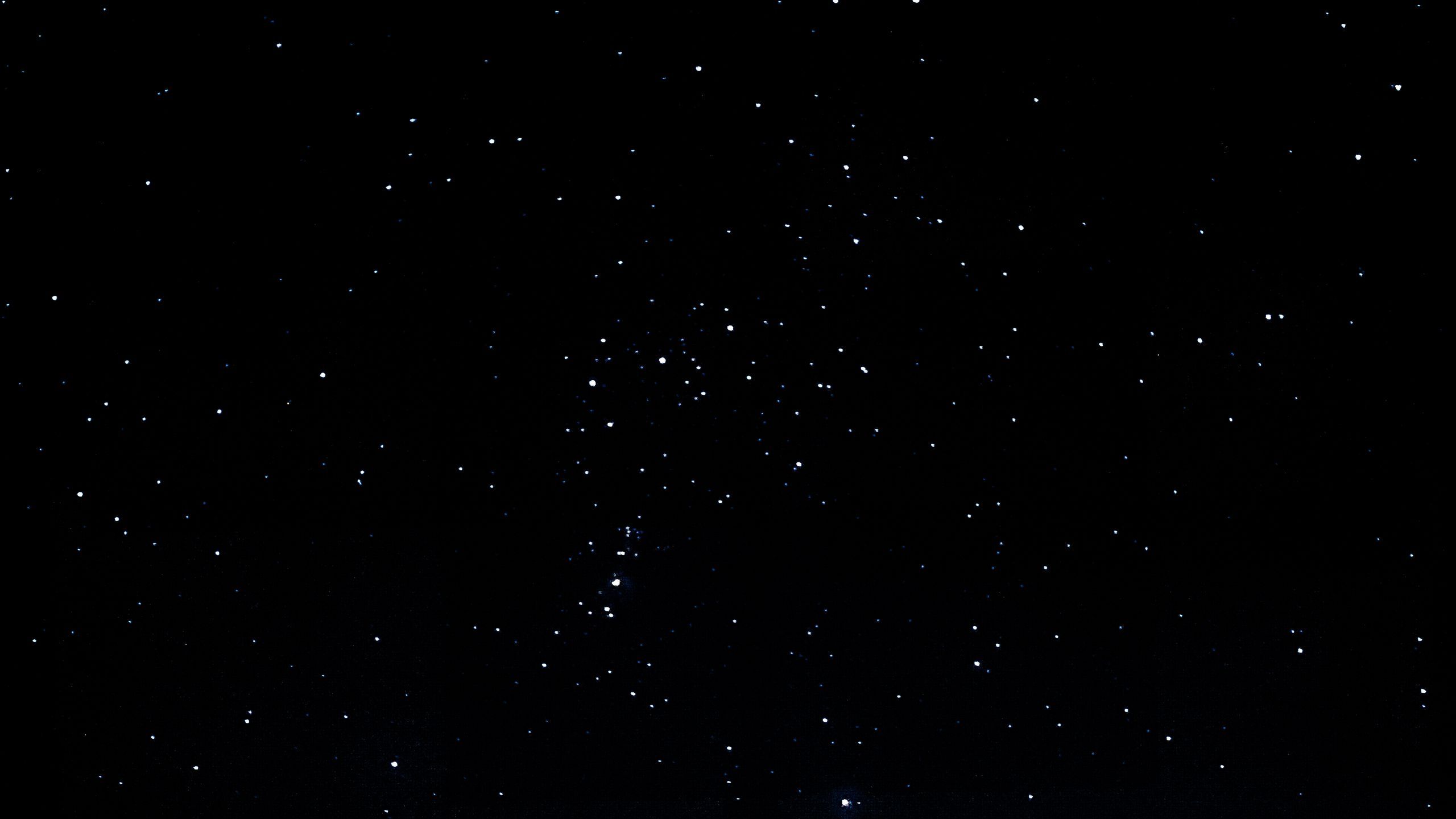 2560x1440 Download wallpaper 2560x1440 starry sky, stars, black widescreen 16:9 HD background