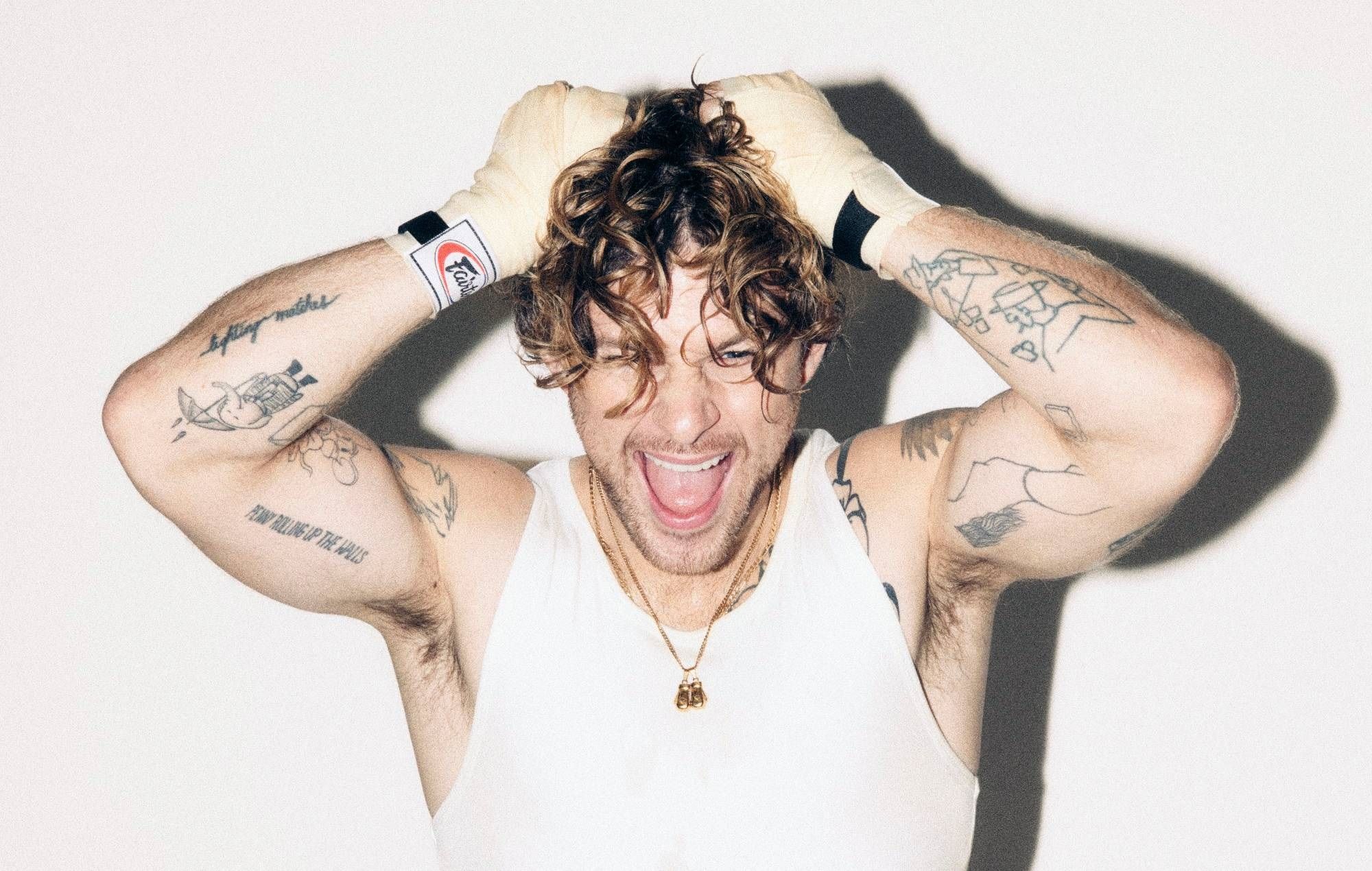 2000x1270 Tom Grennan shares euphoric single 'Shadowboxing' and announces new album 'Everywhere I Went Led Me To Where I Don't Want To Be' along with UK tour