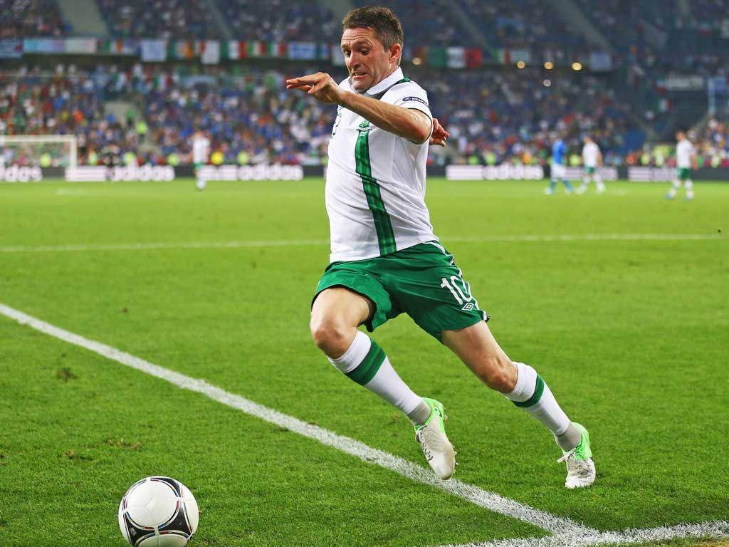 1024x768 Robbie Keane defensive of Giovanni Trapattoni's position with Republic of Ireland