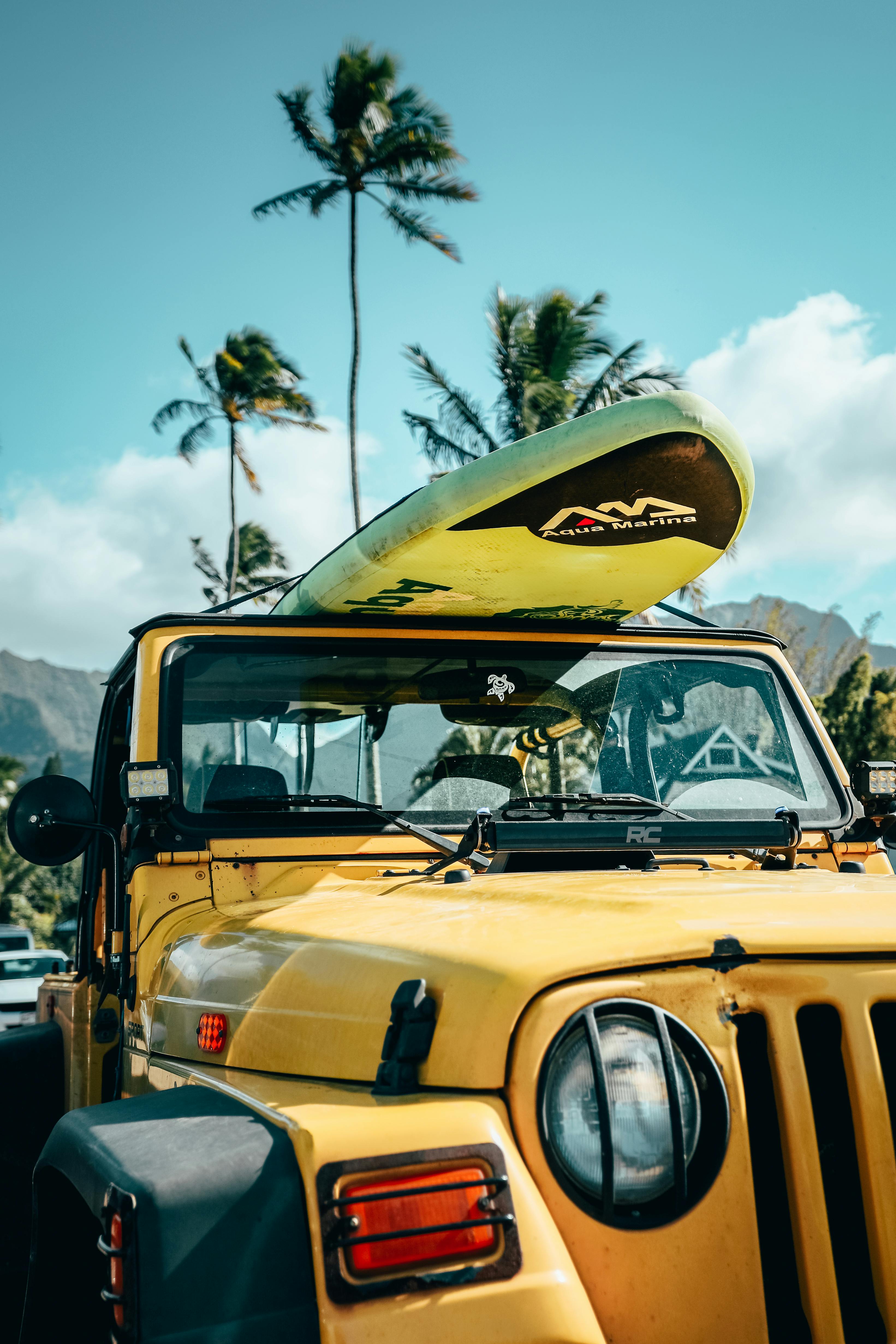 3283x4925 Surfboard on Yellow Jeep · Free