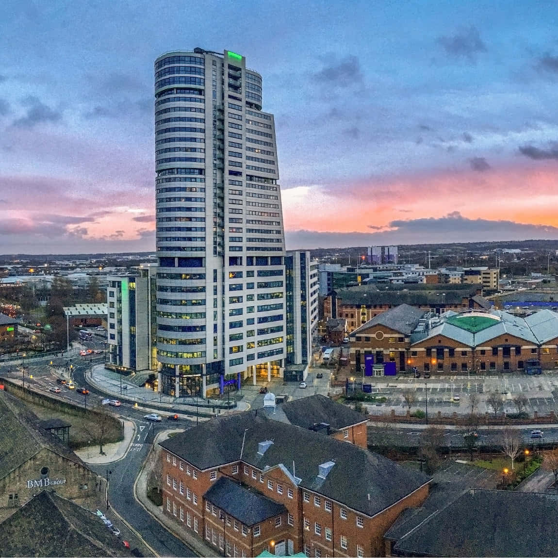 1150x1150 Download Caption: beautiful Dawn At Leeds City Centre Wallpaper