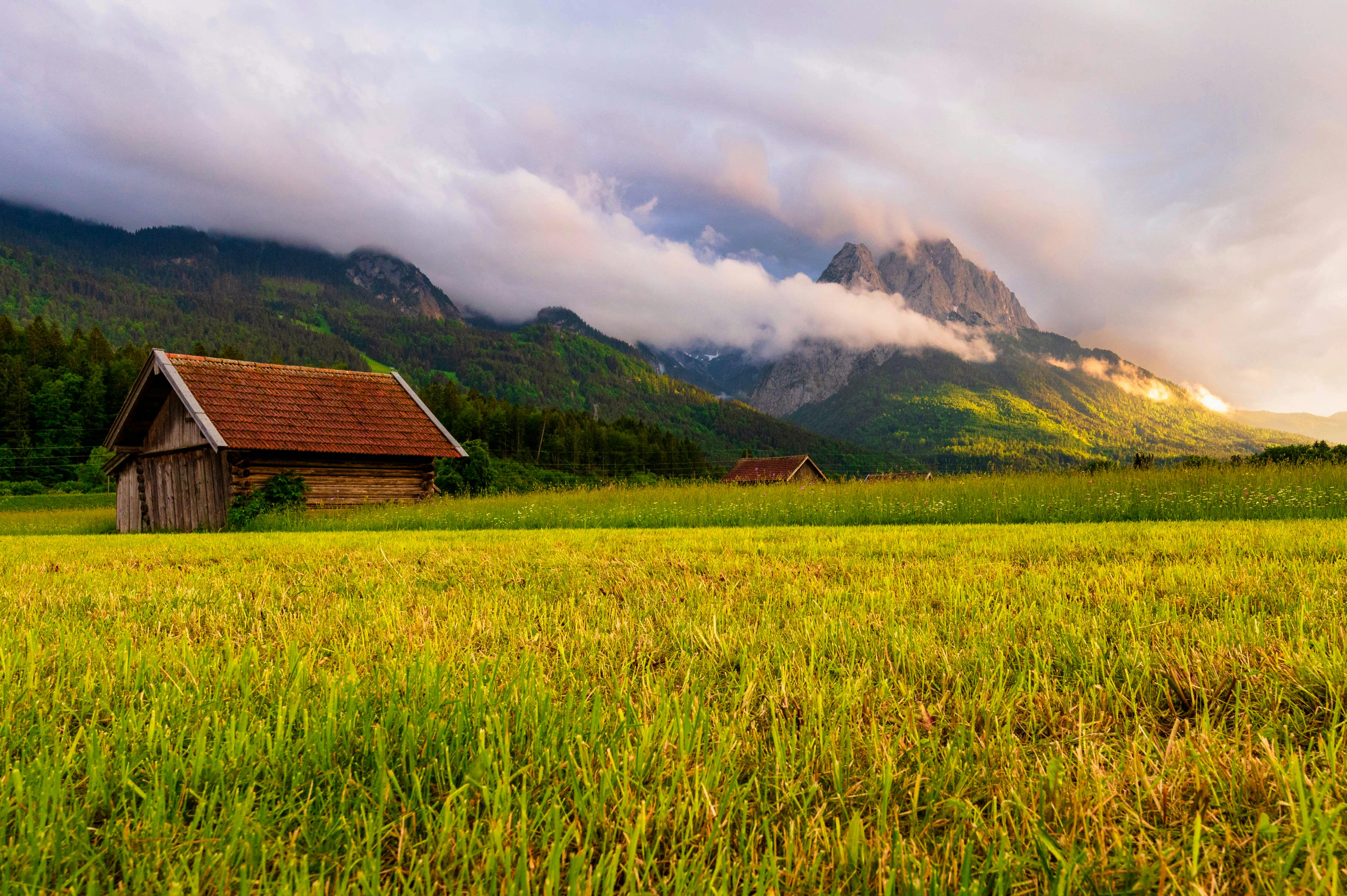 4495x2991 Barn on Grass Field Near Mountains · Free