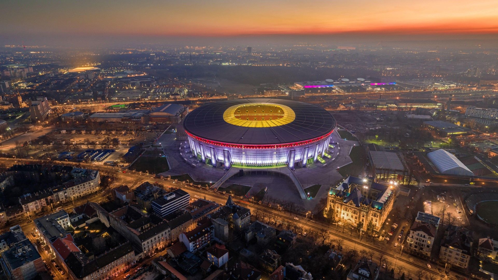1920x1080 Illuminated Ferenc Puskás Stadium in Budapest at dusk, Hungary. Windows Spotlight Image