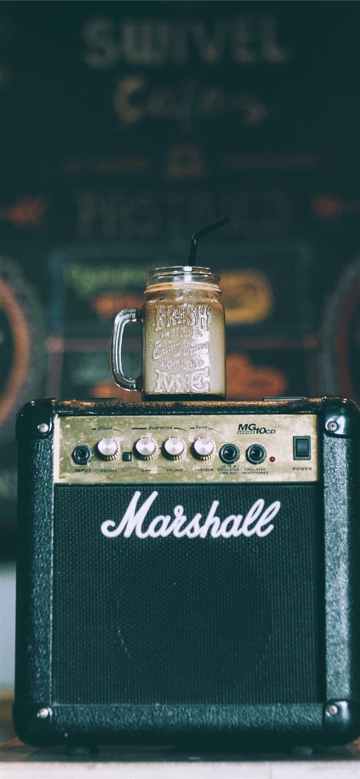 736x1592 black Marshall guitar amplifier with glass mug on. iPhone 11 Wallpaper