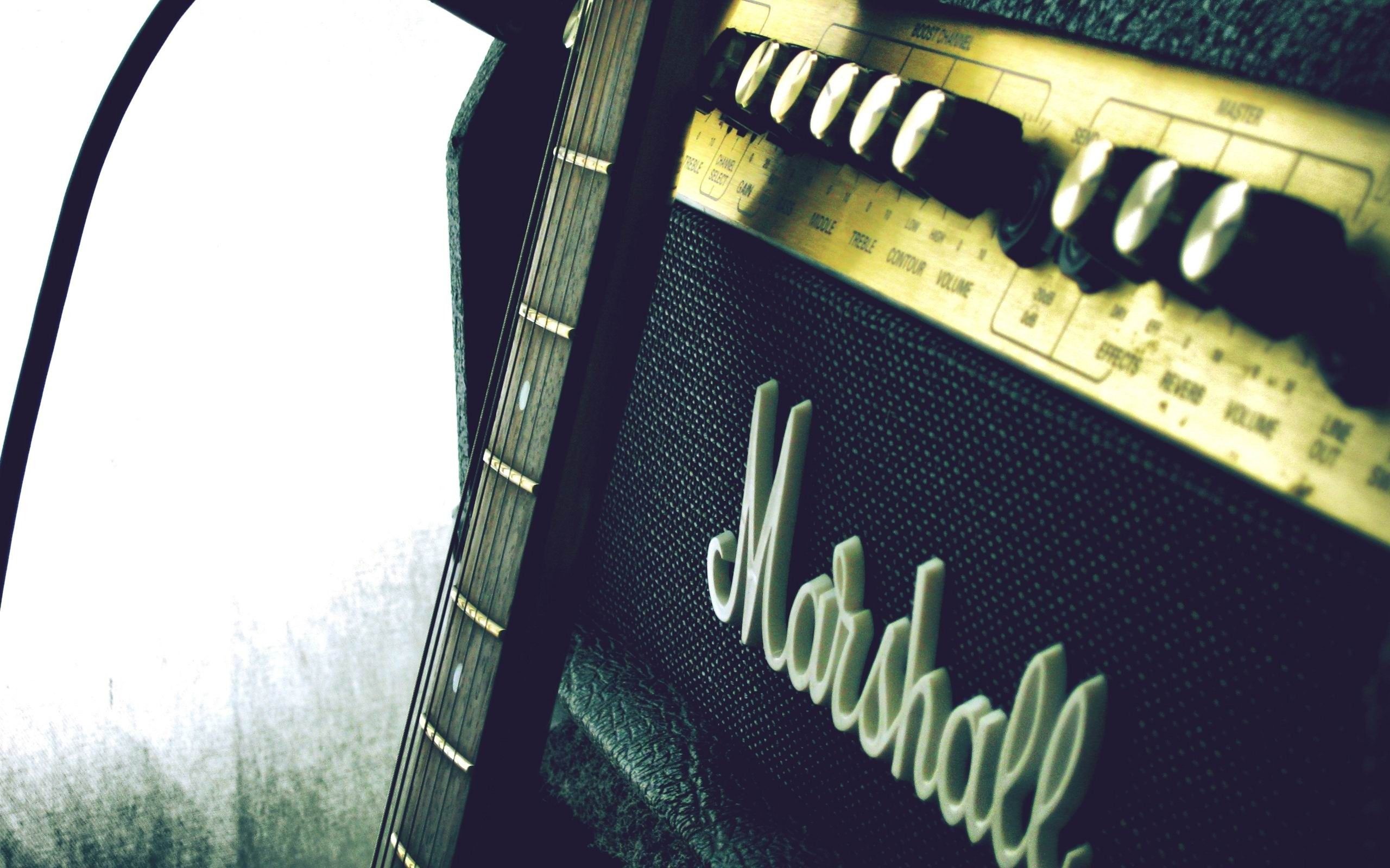 2560x1600 Marshall Amp Guitar Brand Advertising Wallpaper