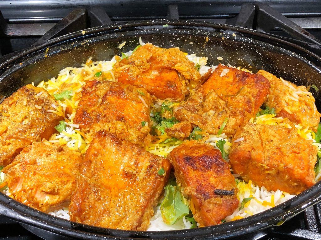 1024x768 Salmon Biryani a traditional rice and fish preparation served on special occasions
