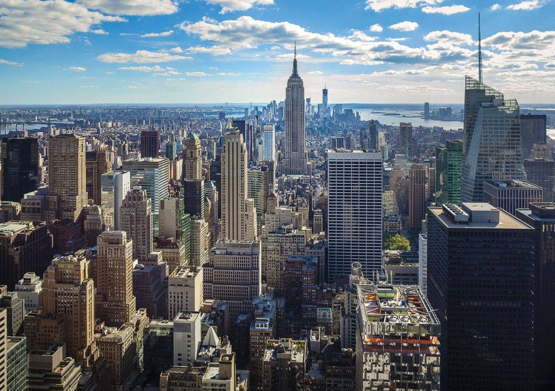 1127x795 Download A Glimpse Of The World Famous NYC Skyline Wallpaper