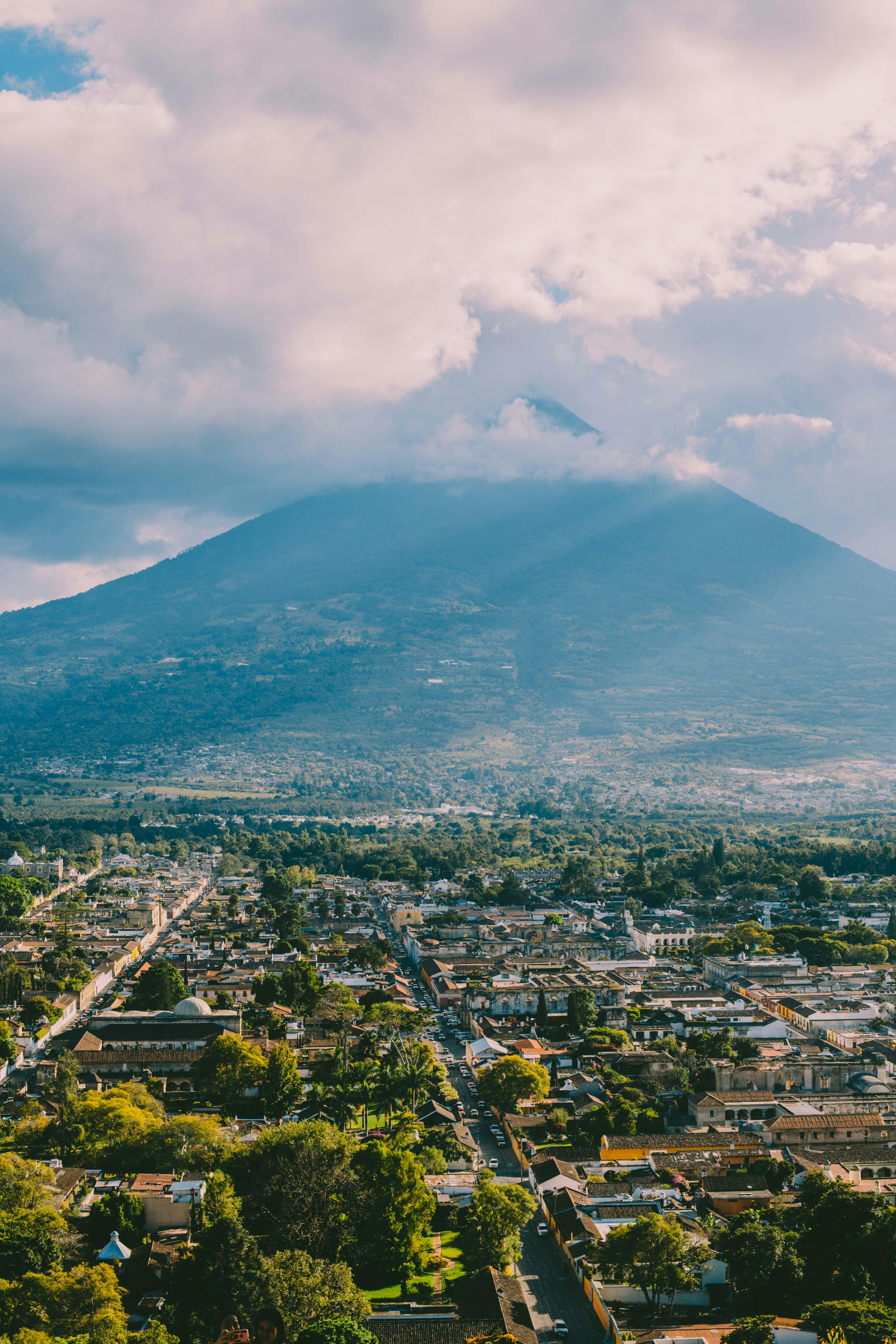 3648x5472 Clouds over the Mountain Above the Cityscape · Free