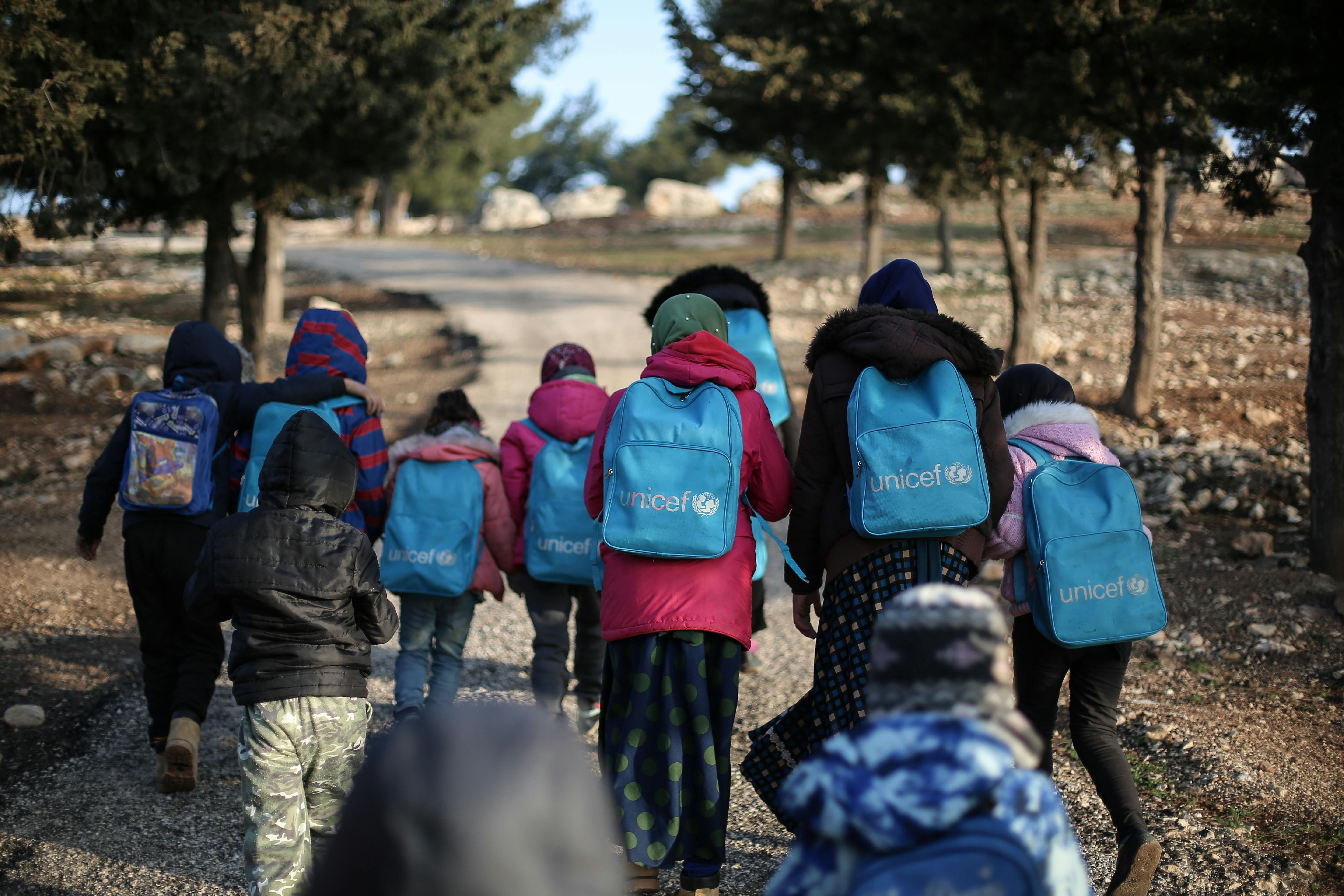 5760x3840 Children Walking with Unicef Backpacks · Free