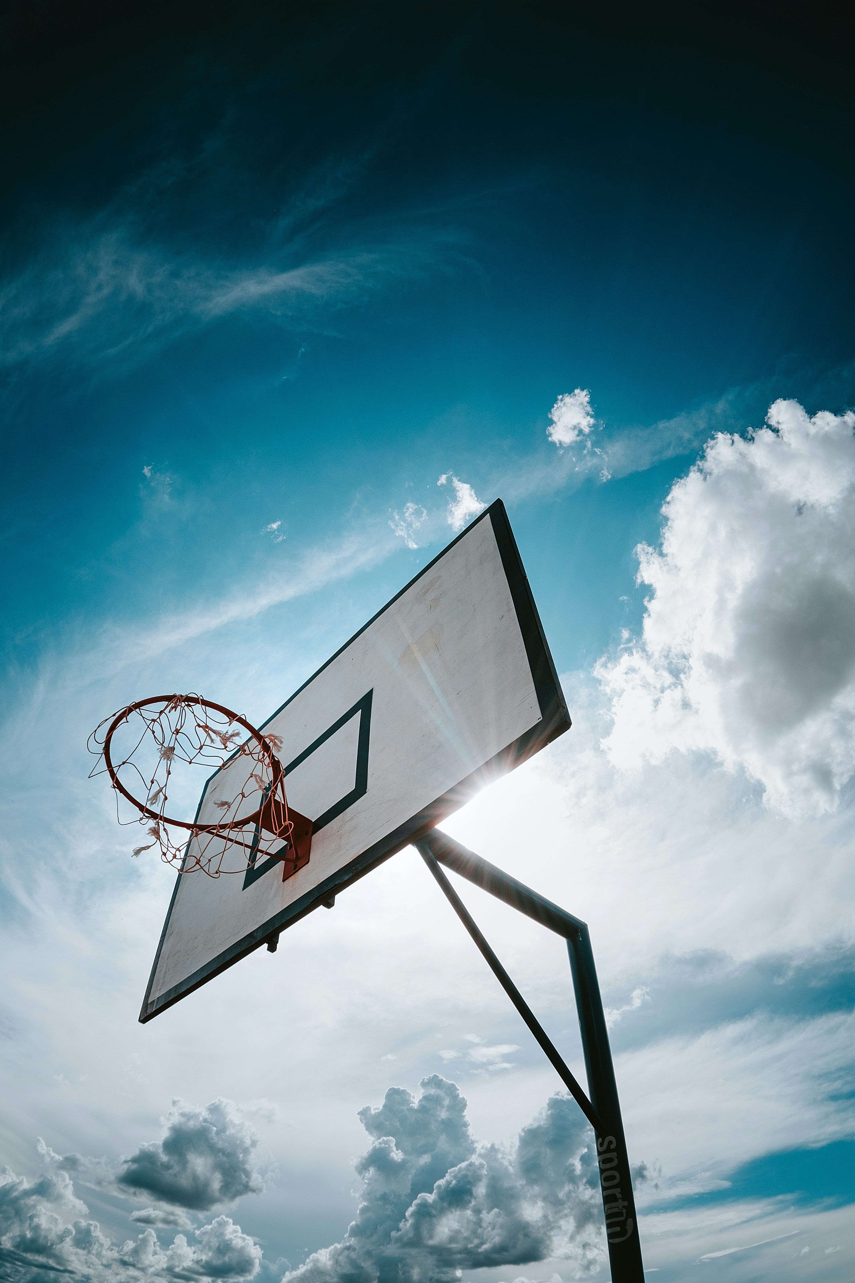 3000x4500 Basketball hoop under blue sky during daytime photo