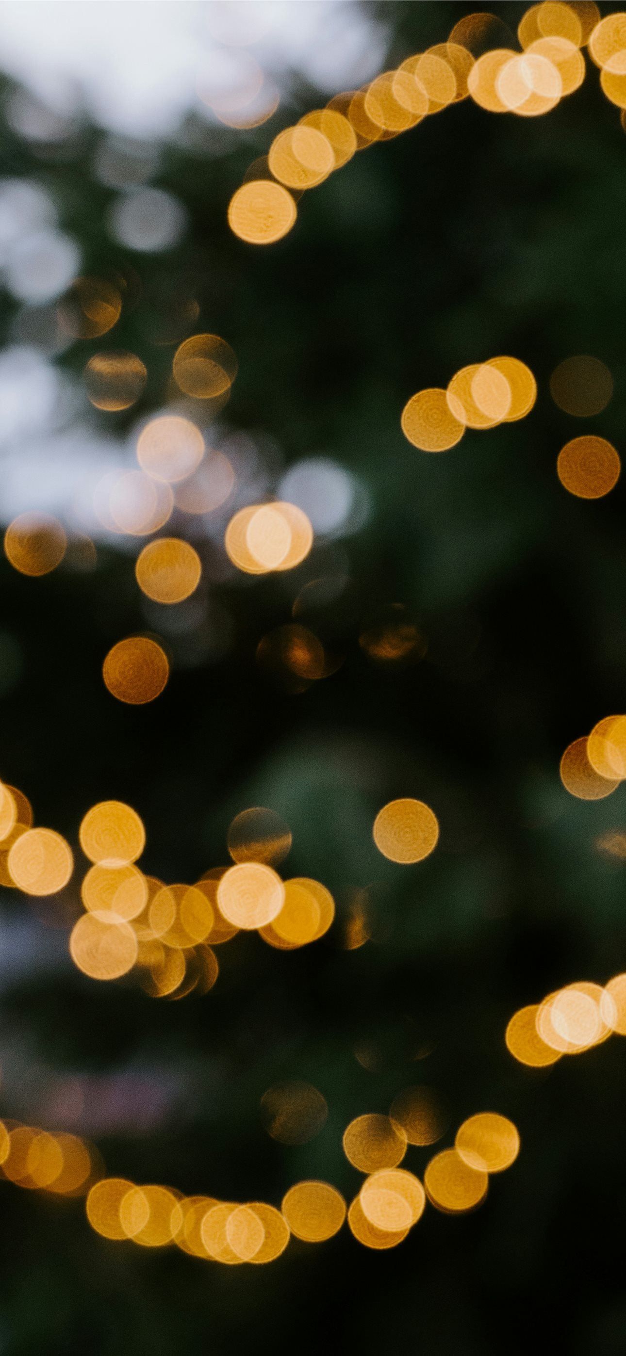 1290x2796 bokeh photography of lights during night time iPhone Wallpaper Free Download