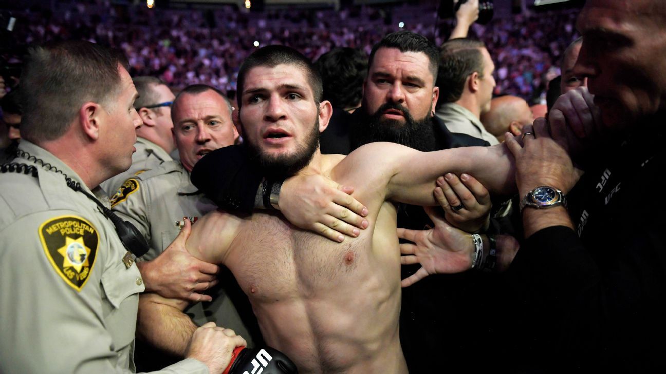 1296x729 Photos: Khabib Nurmagomedov leaves the Octagon, sparking postfight brawl