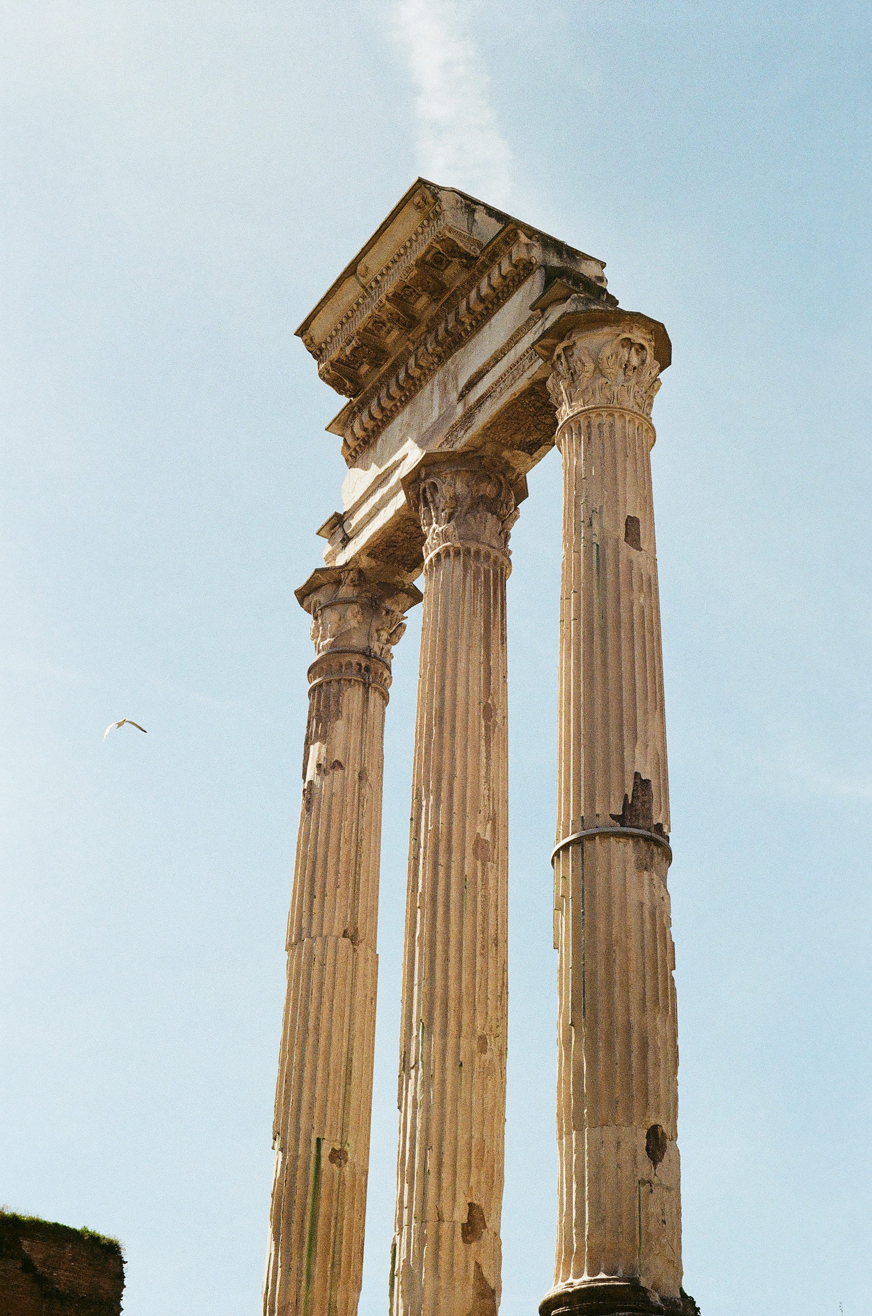 3000x4525 A tall pillar with two columns on top of it photo