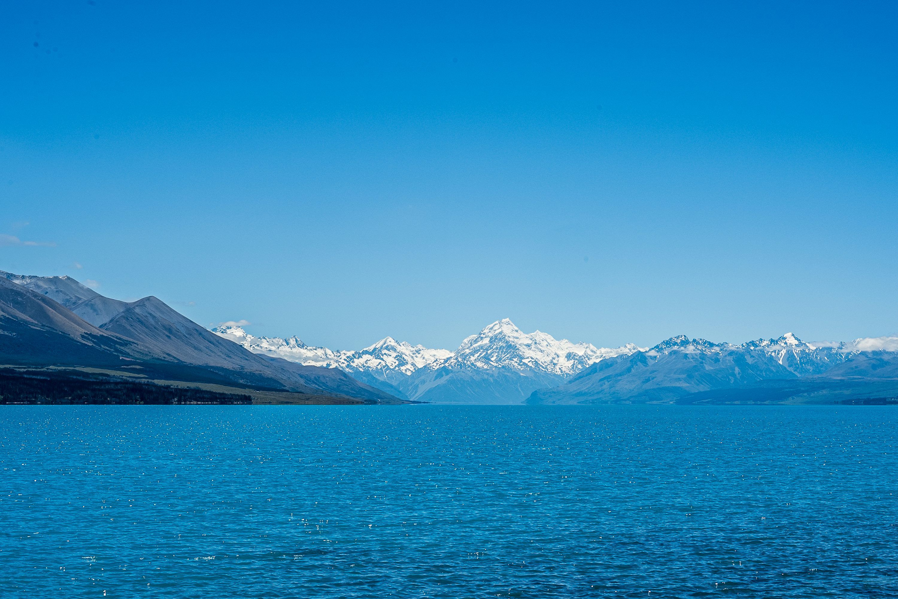 3000x2000 Lake And Snow Capped Mountains Under Blue Sky. Photo