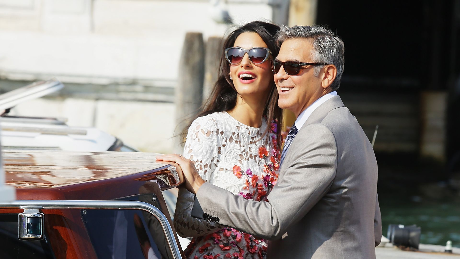 1920x1080 George and Amal Clooney share a romantic kiss while dining in Italy