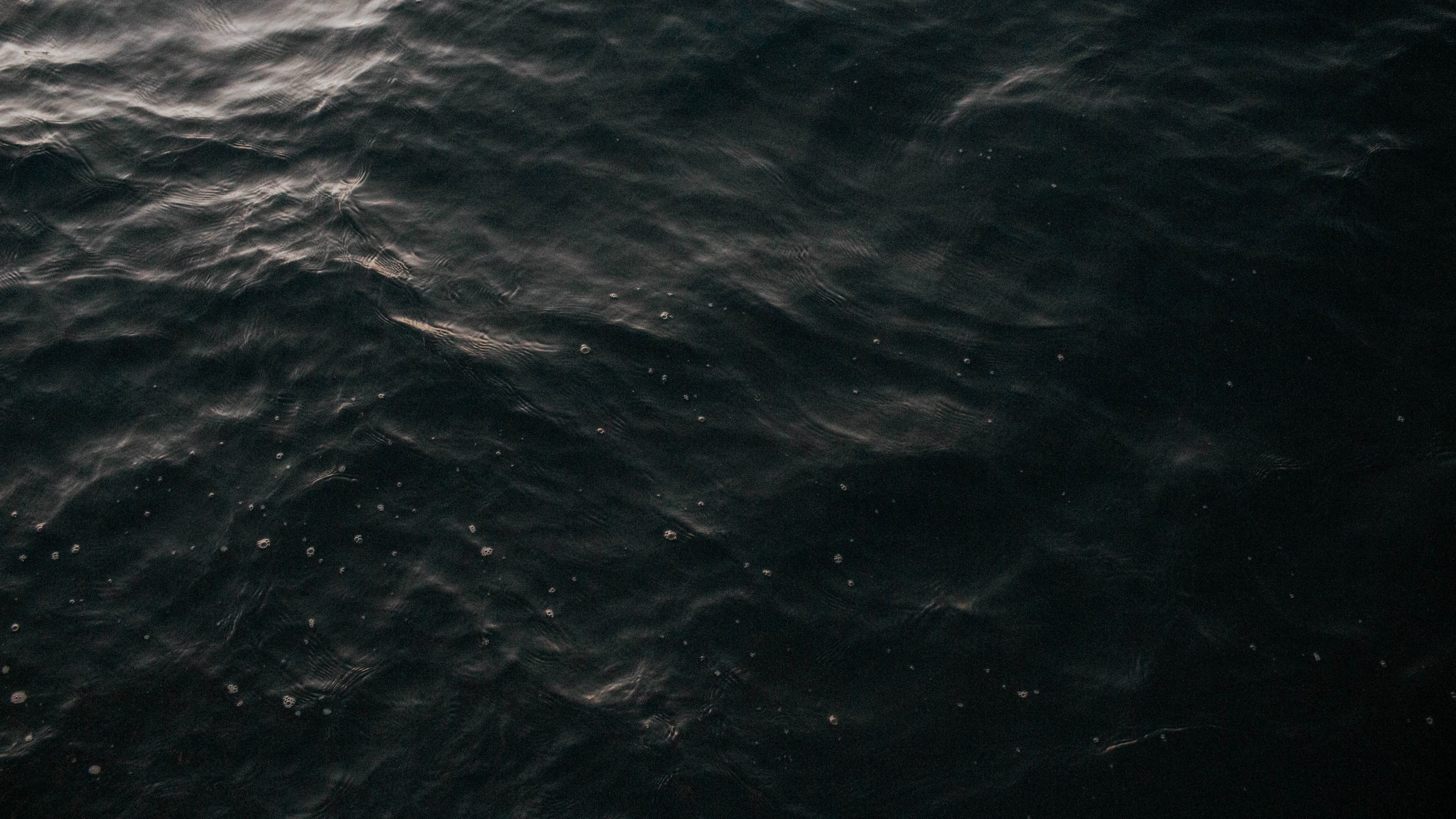 3840x2160 Download wallpaper 3840x2160 water, waves, dark, surface 4k uhd 16:9 HD background