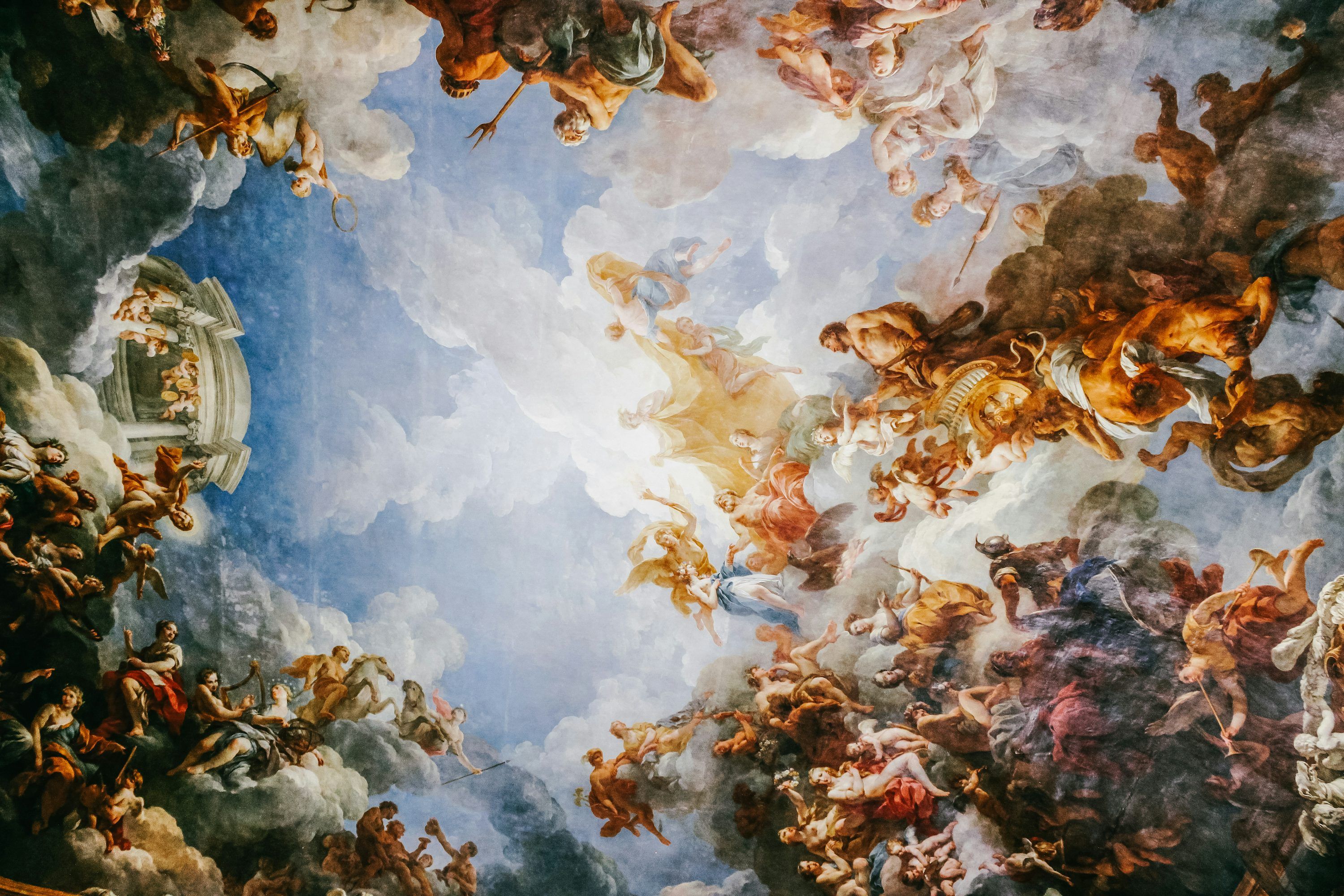 3000x2000 A baroque ceiling painting depicts figures in the sky. photo