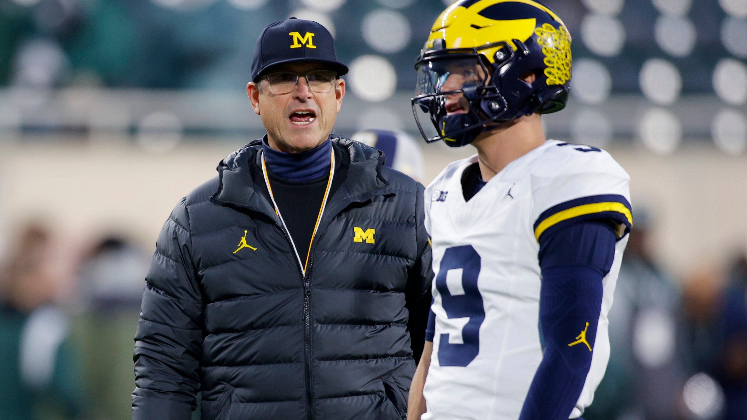 2560x1440 Coach Jim Harbaugh Banned From 3 Games Over Sign Stealing Allegations. Michigan Asks Judge For Stay