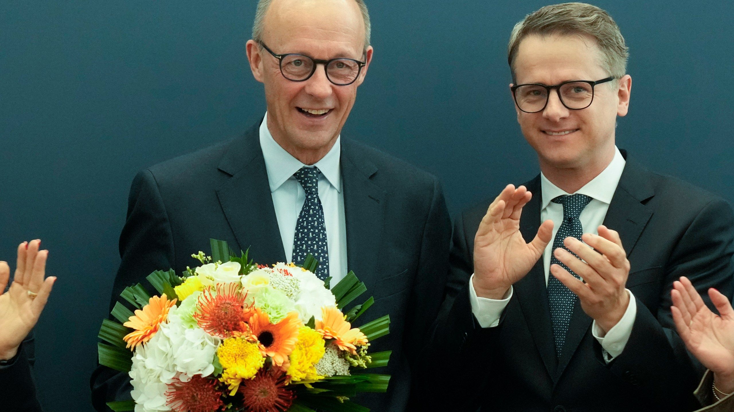 2560x1440 The Latest: Opposition leader Merz set to form Germany's next government