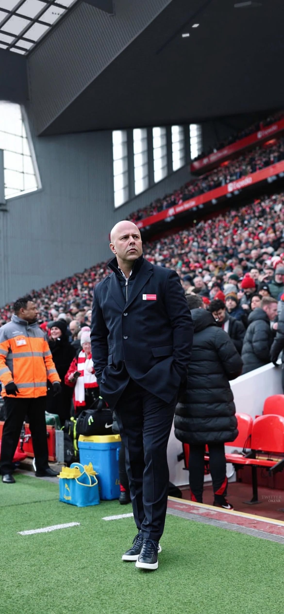 1170x2531 Arne Slot observing at Anfield Stadium Football Wallpaper