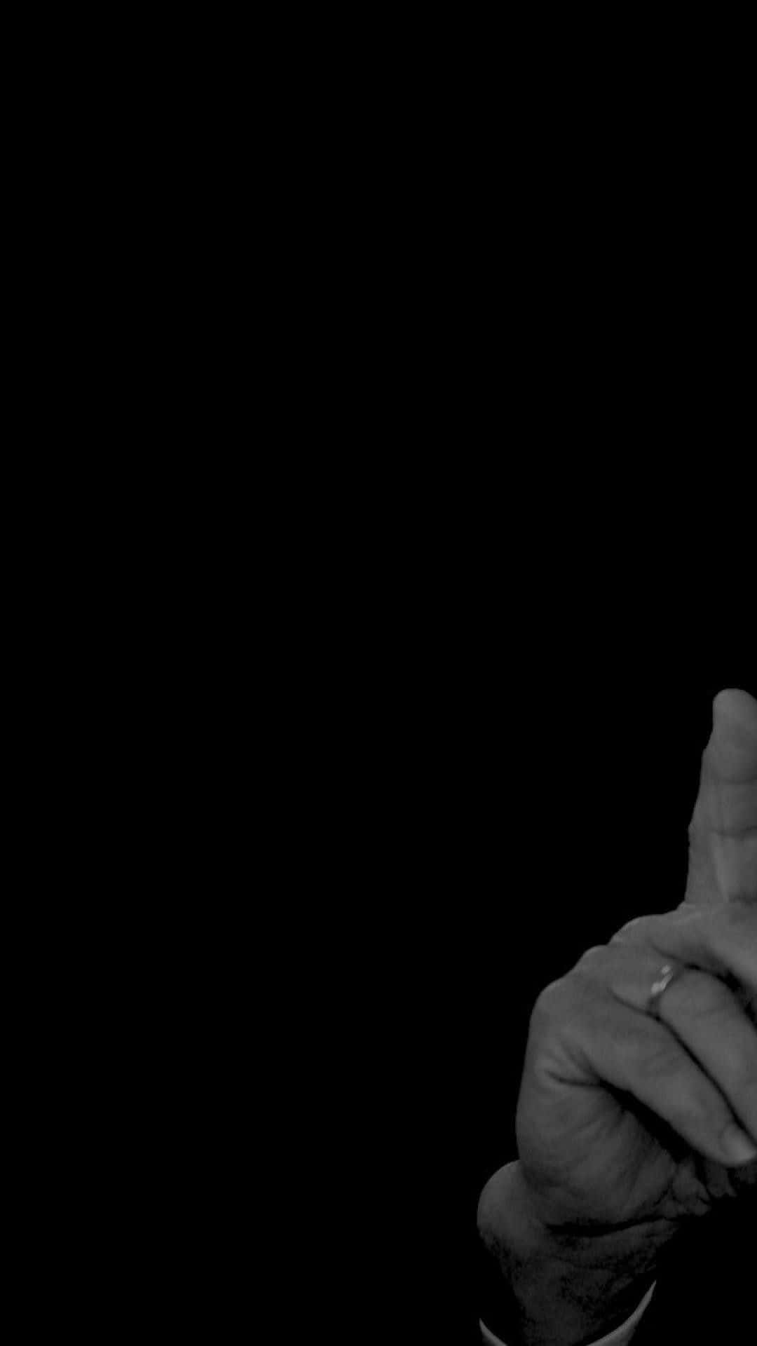 1080x1920 Download A Man Is Pointing His Finger Wallpaper