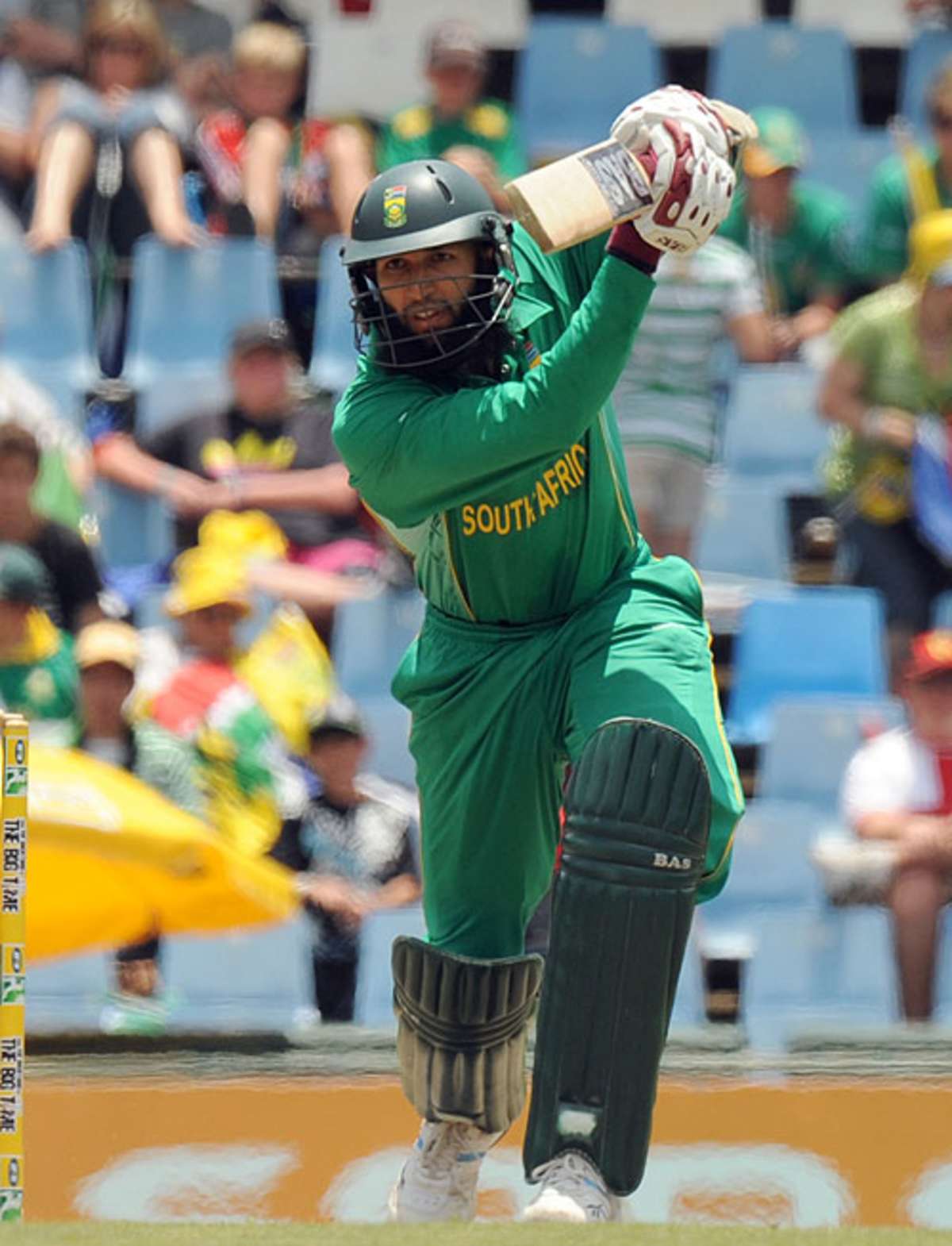 1200x1570 Hashim Amla drives down the ground during his 57