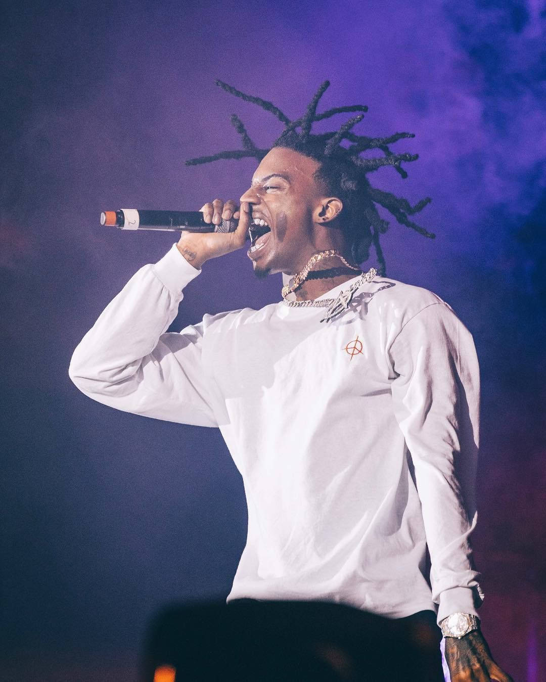 1080x1349 Download Playboi Carti singing while jumping Wallpaper