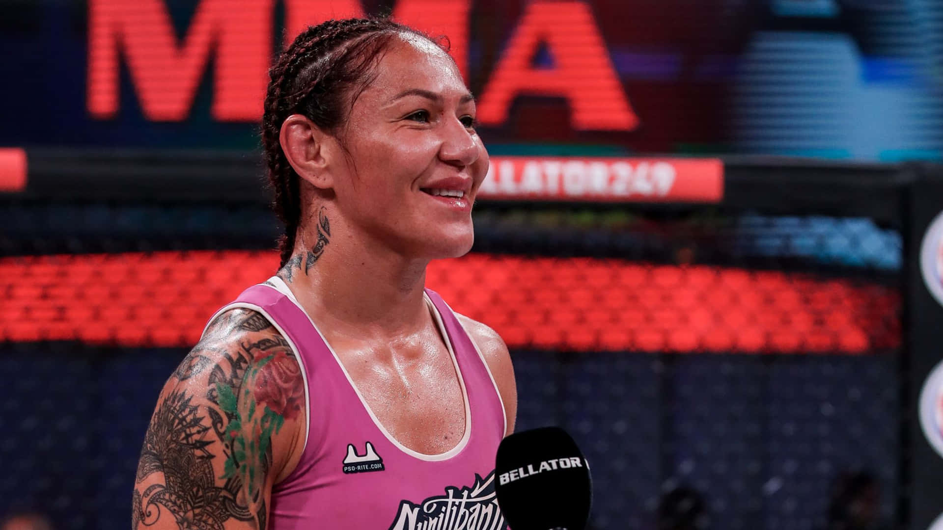1920x1080 Download Caption: Empowering Smile of Cris Cyborg, the American UFC Athlete Wallpaper