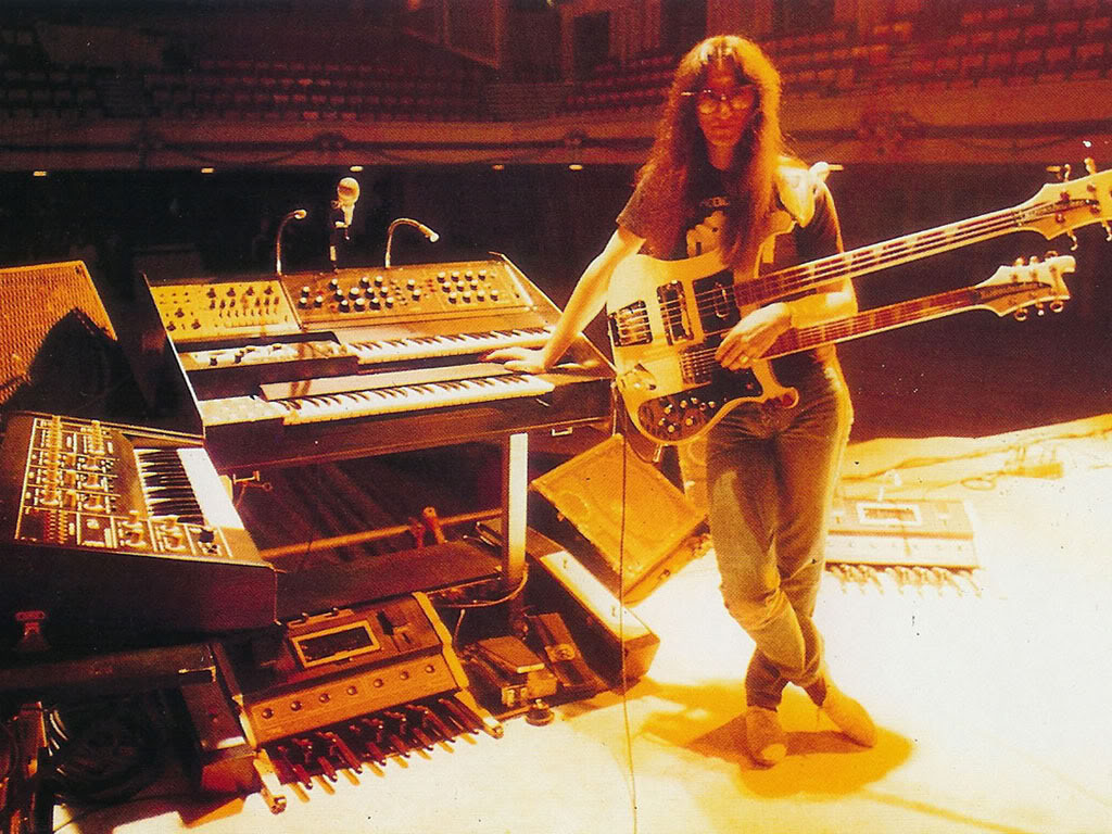 1024x768 Geddy in the analog era. The busiest man in rock music!