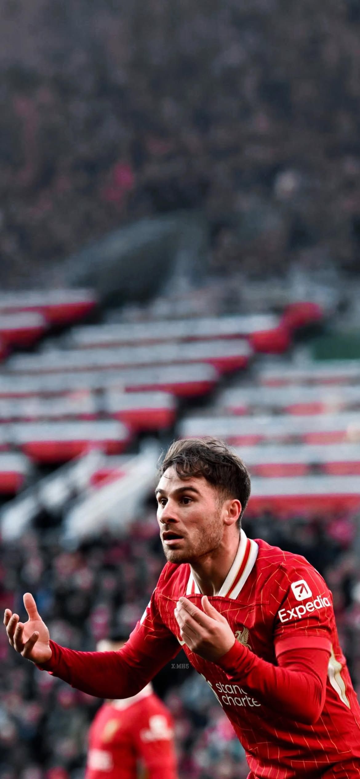 1170x2530 Alexis Mac Allister in action for Liverpool Football Wallpaper