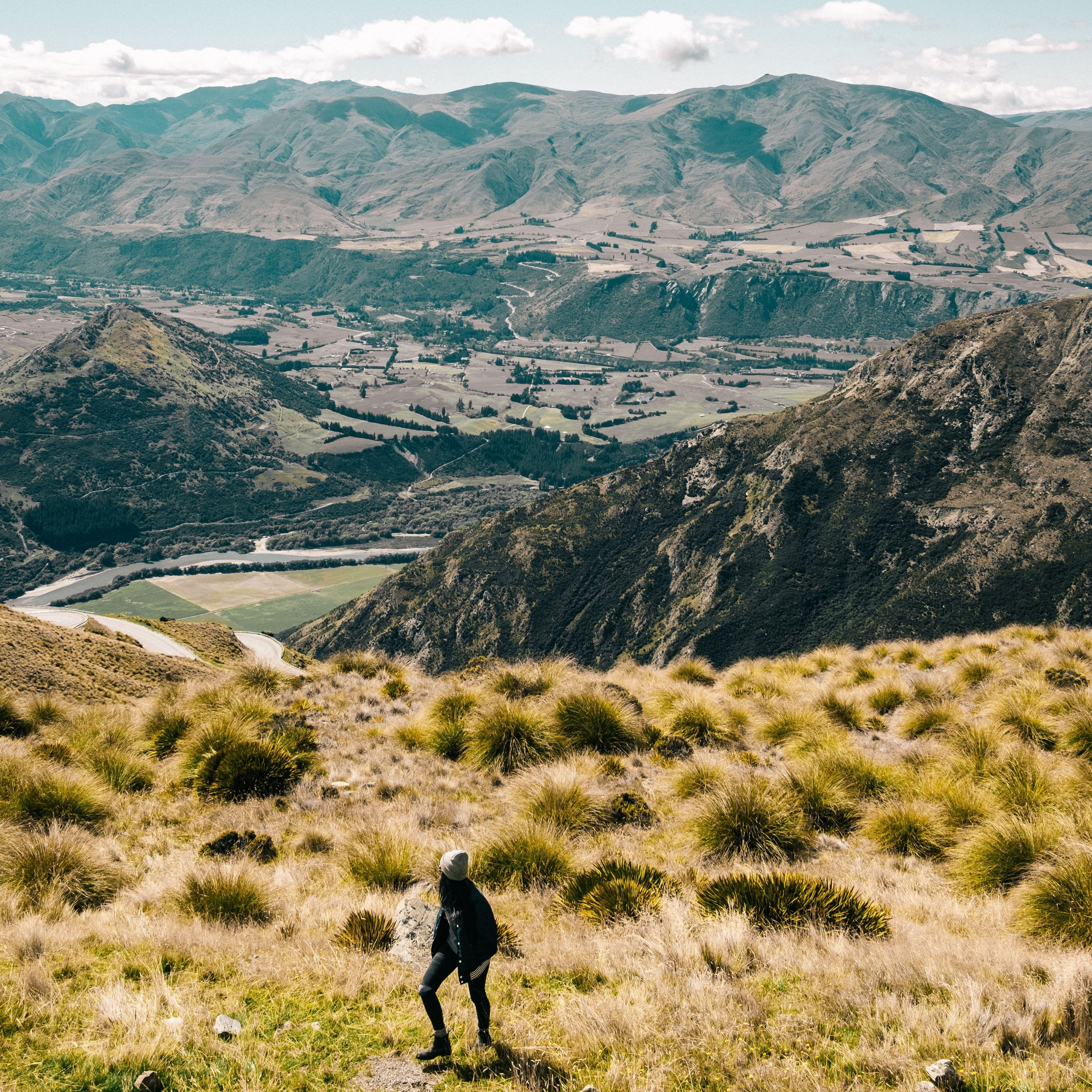 3415x3415 Download wallpaper 3415x3415 girl, mountains, grass, travel