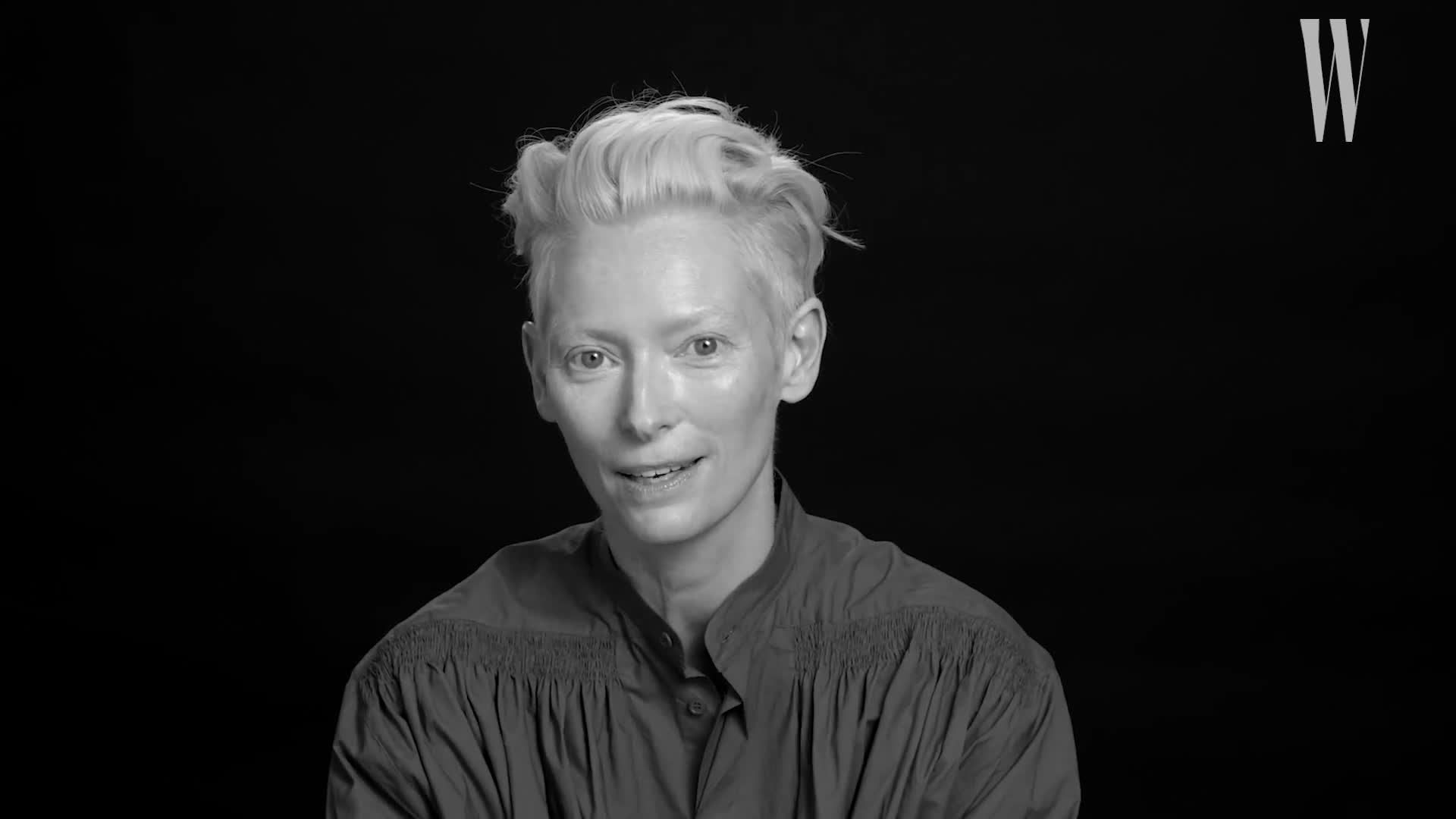 1920x1080 Tilda Swinton Cuddles with a Puppy During a New Interview