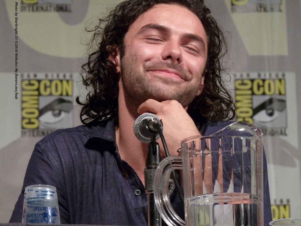 1024x768 Aidan Turner looking mighty satisfied with life at the 2010 San Diego Comic Con. Can't believe that I didn't even know AT