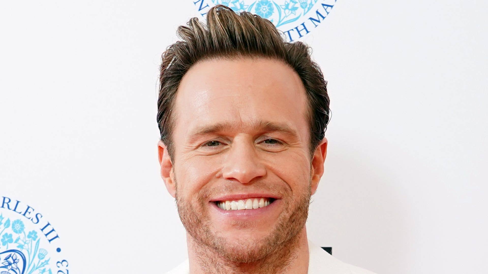 1920x1080 Olly Murs is a doting dad as he cradles baby daughter Madison in new photo